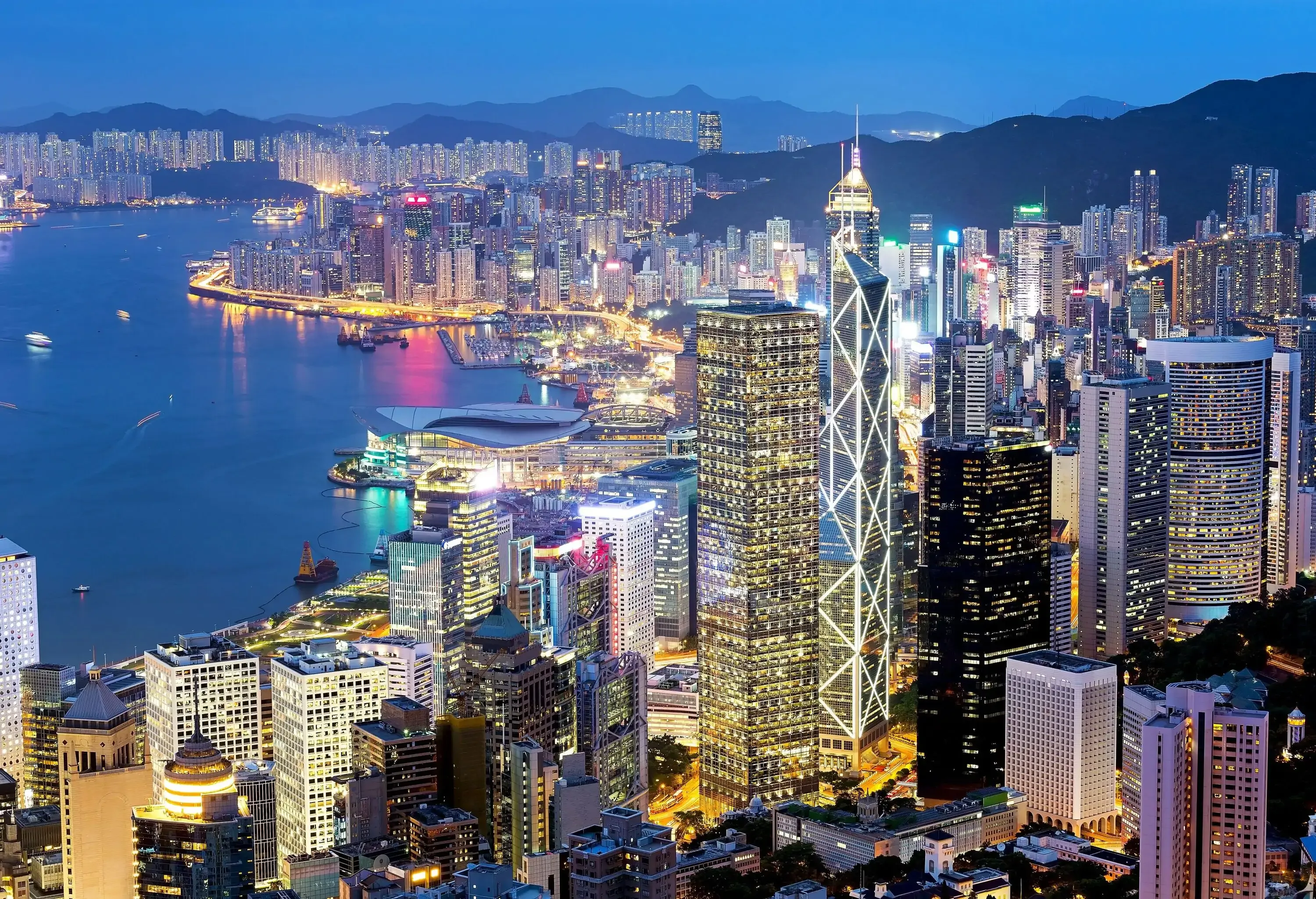 An awe-inspiring view of the Hong Kong city skyline, where a majestic river gracefully cuts through the metropolis, adding a touch of natural beauty to the urban marvels.