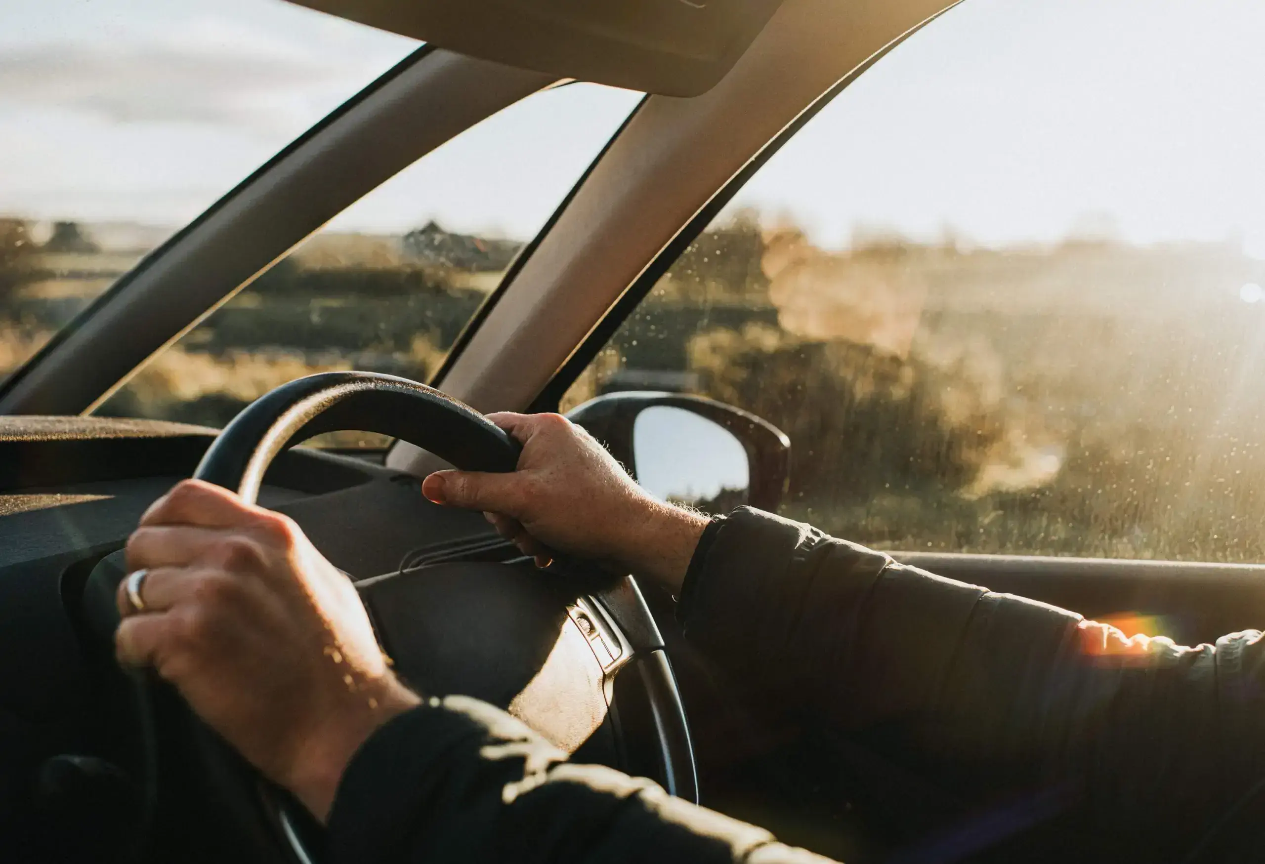 A person driving a car