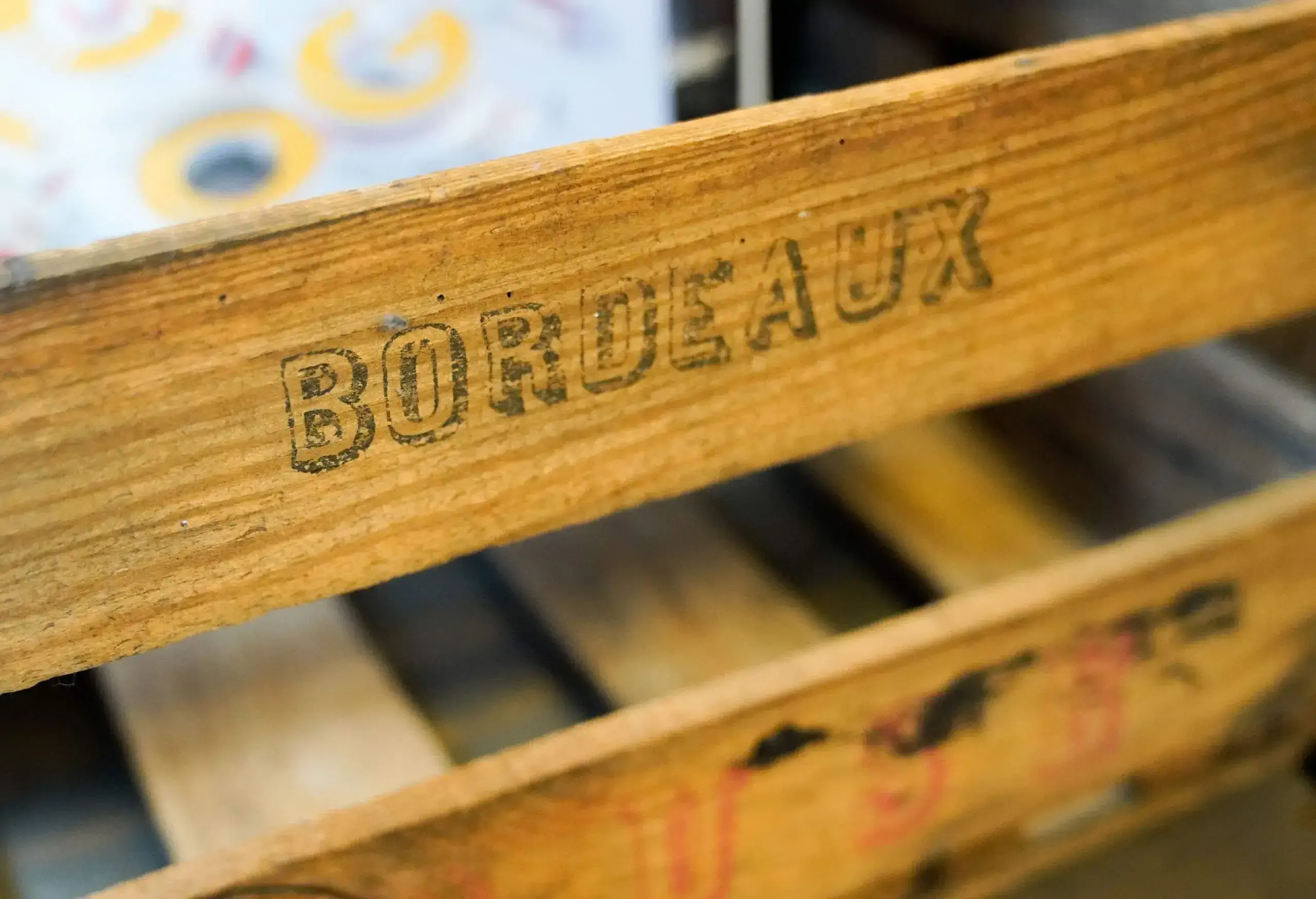 A wooden crate printed with the word "BORDEAUX."