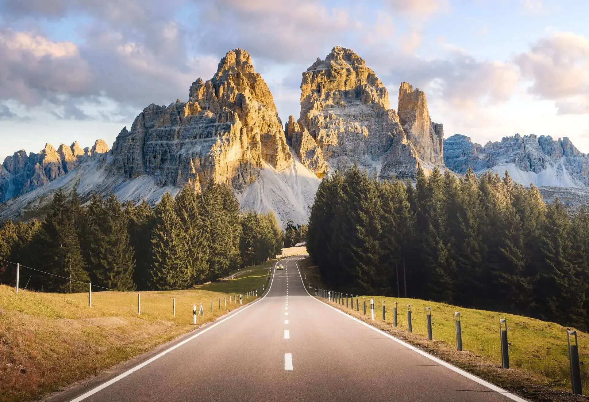 Road leading to the Dolomites mountains in Northern Italy