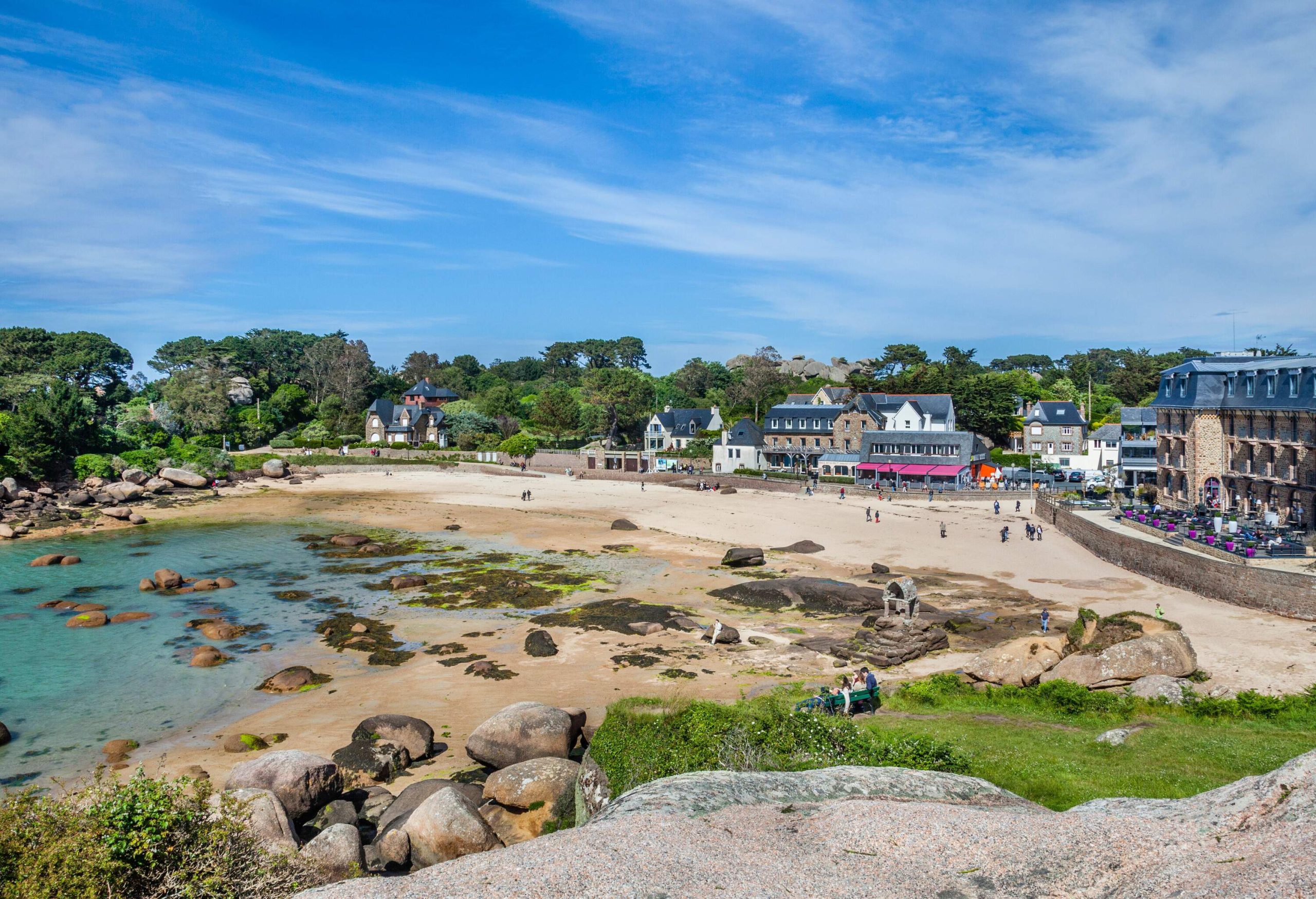 France, Brittany, Cotes d'Armor department, Cote de Granit Rose (Pink granite coast), Perros-Guirec, view of Saint-Guirec Beach with the Oratory of Saint-Guirec, a 12th century shrine with a statue of the saint