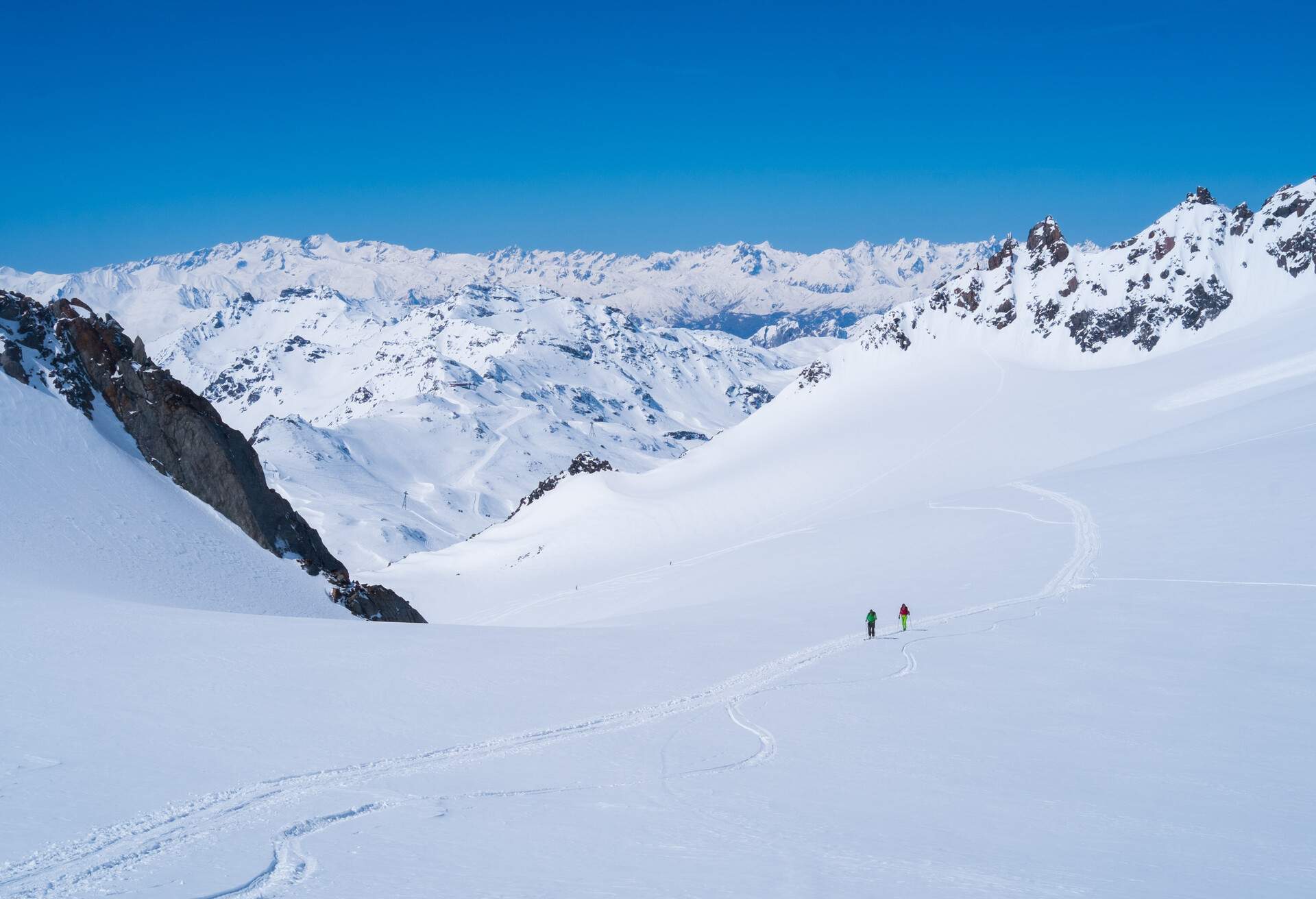 Ski alpinists skiing on the high mountans of Val Thorens, France