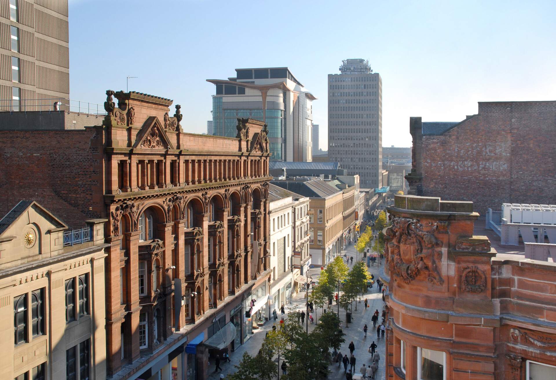 One of the main shopping streets in Glasgow, UK. About 10am on a sunny and crisp autumn day.
