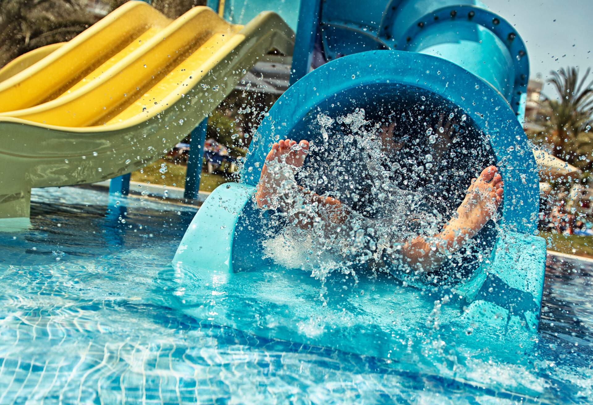 A child is enjoying a water park