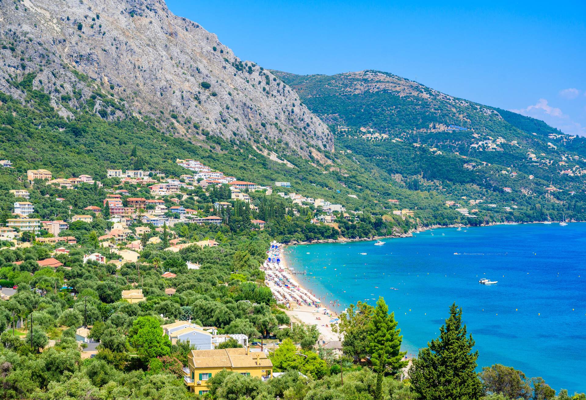 Barbati Beach with crystal clear azure water in beautiful landscape scenery - paradise coastline of Corfu island, Ionian archipelago, Greece.