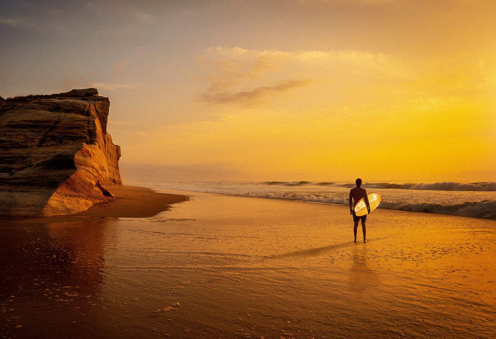 DEST_PORTUGAL_THEME_PEOPLE_MAN_SURFING_GettyImages-1328476579.jpg