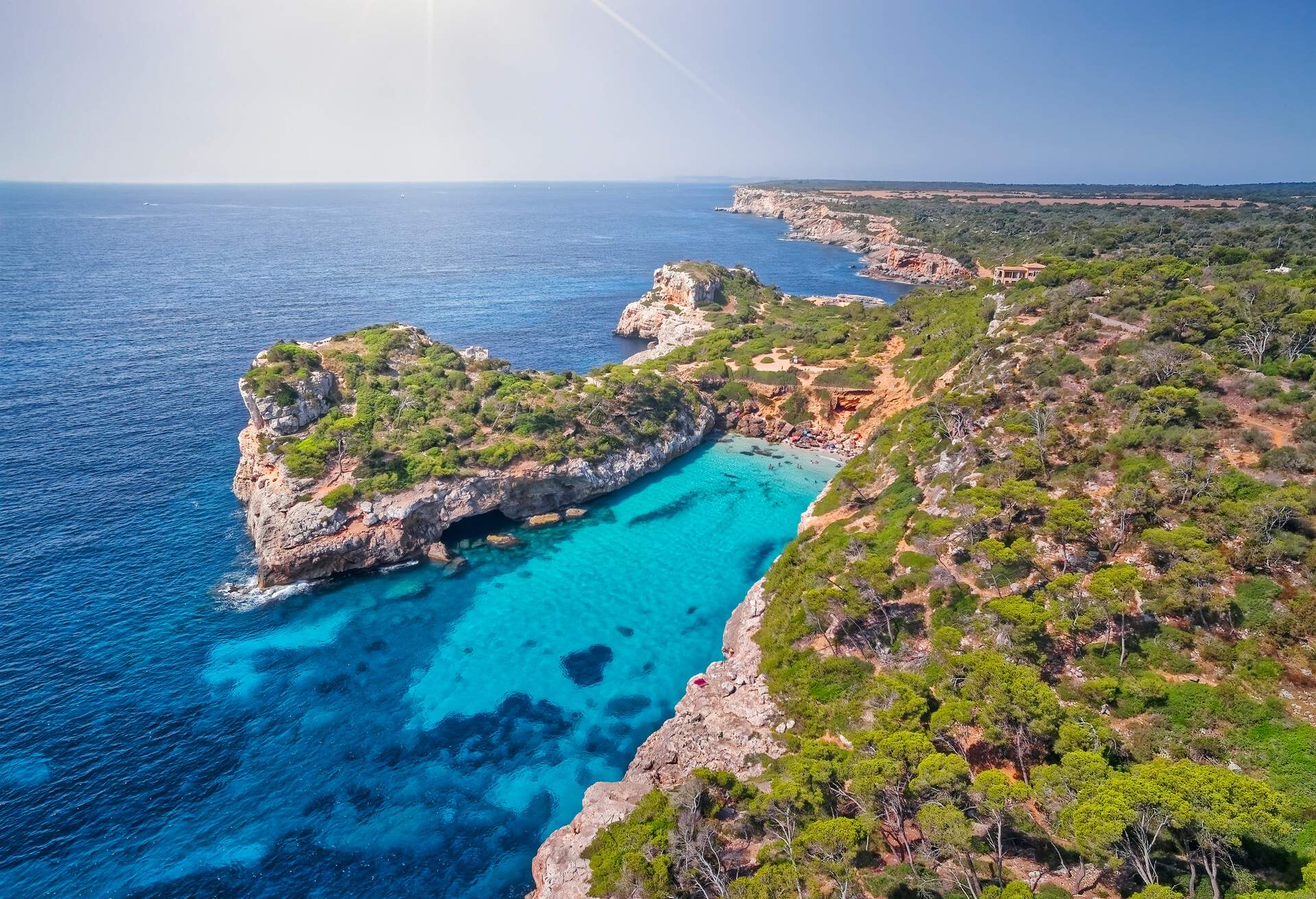 Caló des Moro ('small bay'), also Cala de Sa Comuna, is a bay in the southeast of the Spanish Balearic island of Mallorca. It is located on the coast of the municipality of Santanyí, southwest of the village of Cala Llombards, towards Cap de Ses Salines, the South Cape Mallorcas.