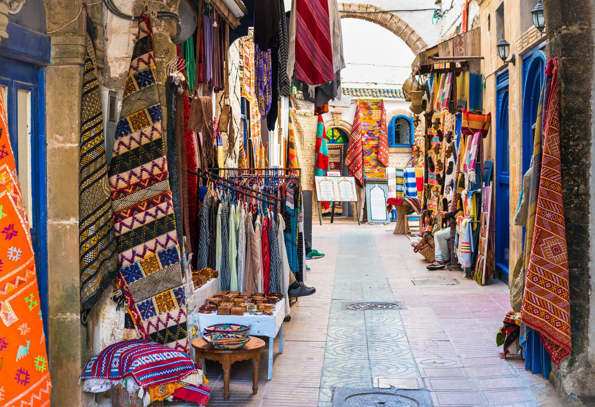 Moroccan handmade crafts, carpets and bags hanging in the narrow street of Essaouira in Morocco with selective focus; Shutterstock ID 790133260; SF SSA Case with Manager Approval: SF6759285; Job: ; Client/Licensee: ; Other: