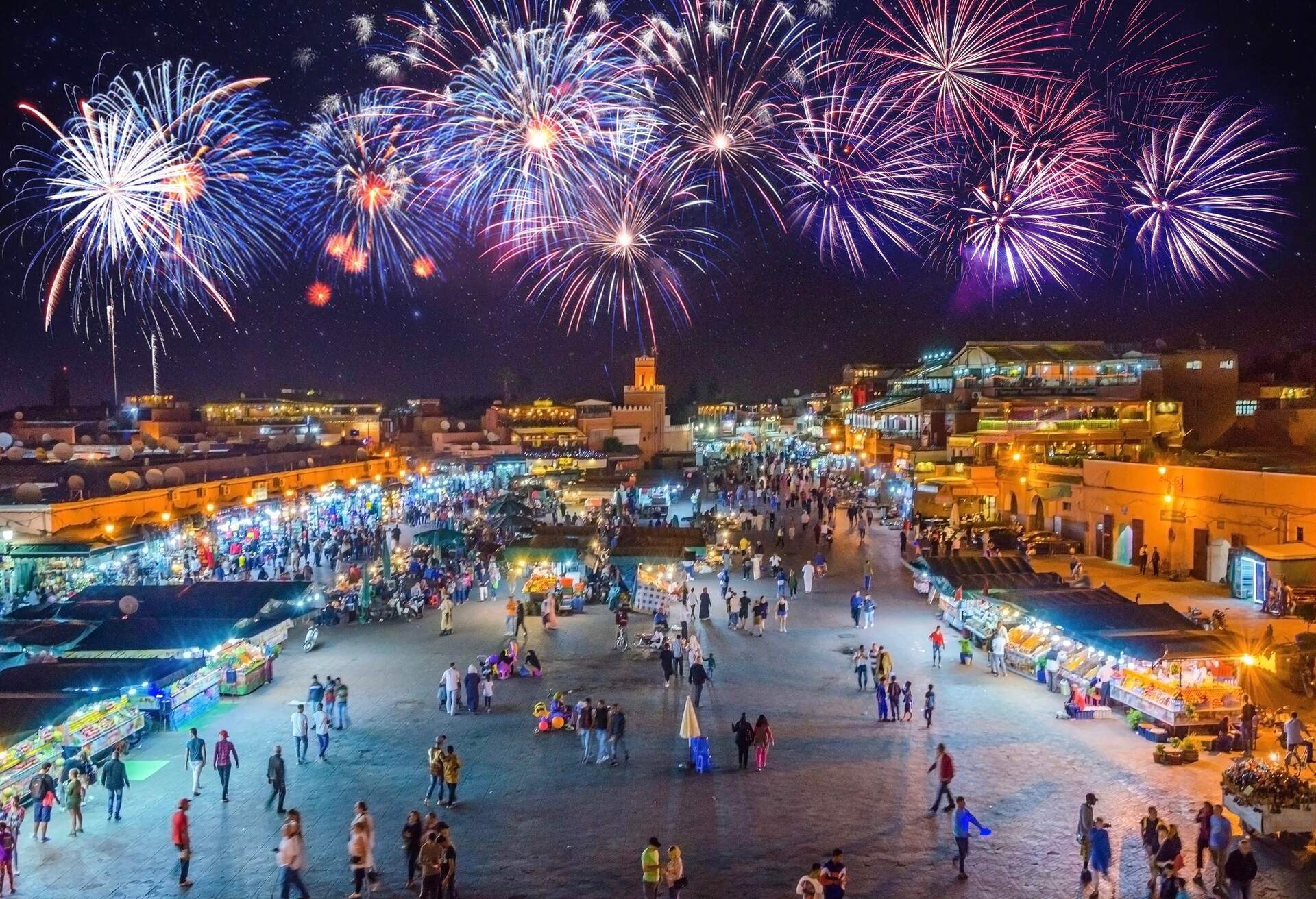 Jamaa el Fna market square in Marrakesh's medina with fireworks, Marrakesh, Morocco
