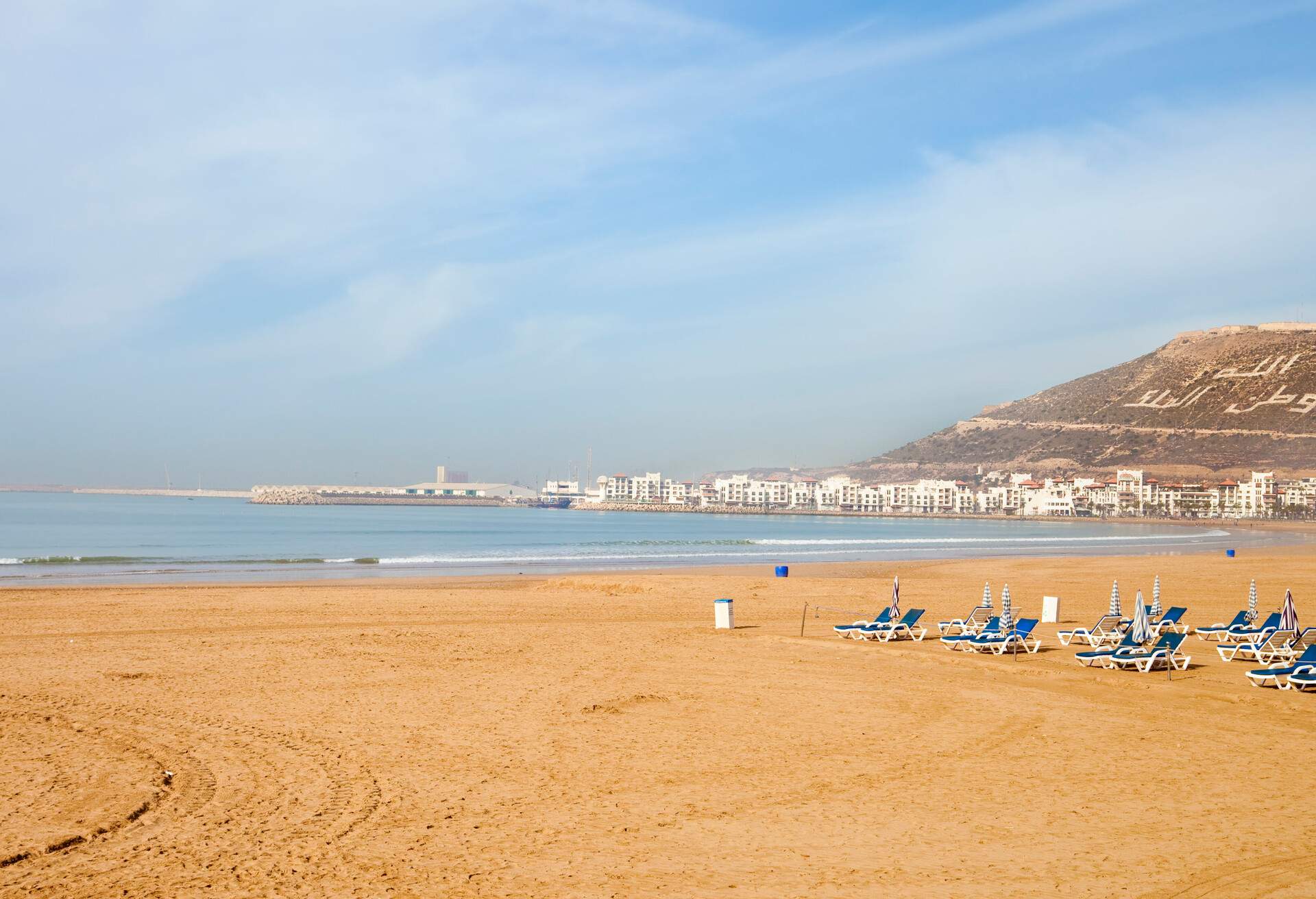 Agadir. The inscription on the mountain - God, King, Country