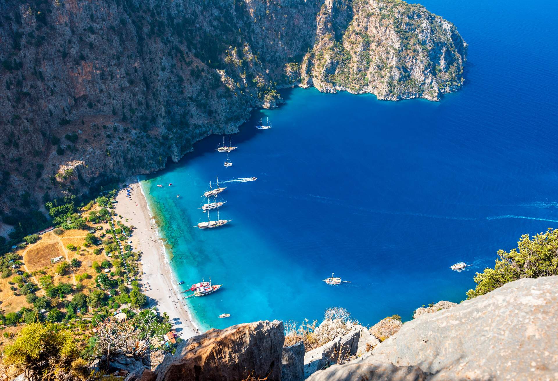 Butterfly Valley (Turkish: Kelebekler Vadisi) is a valley in Fethiye district, Mugla Province, on the Mediterranean coast of Turkey. Oludeniz - Fethiye, Mugla, Turkey.