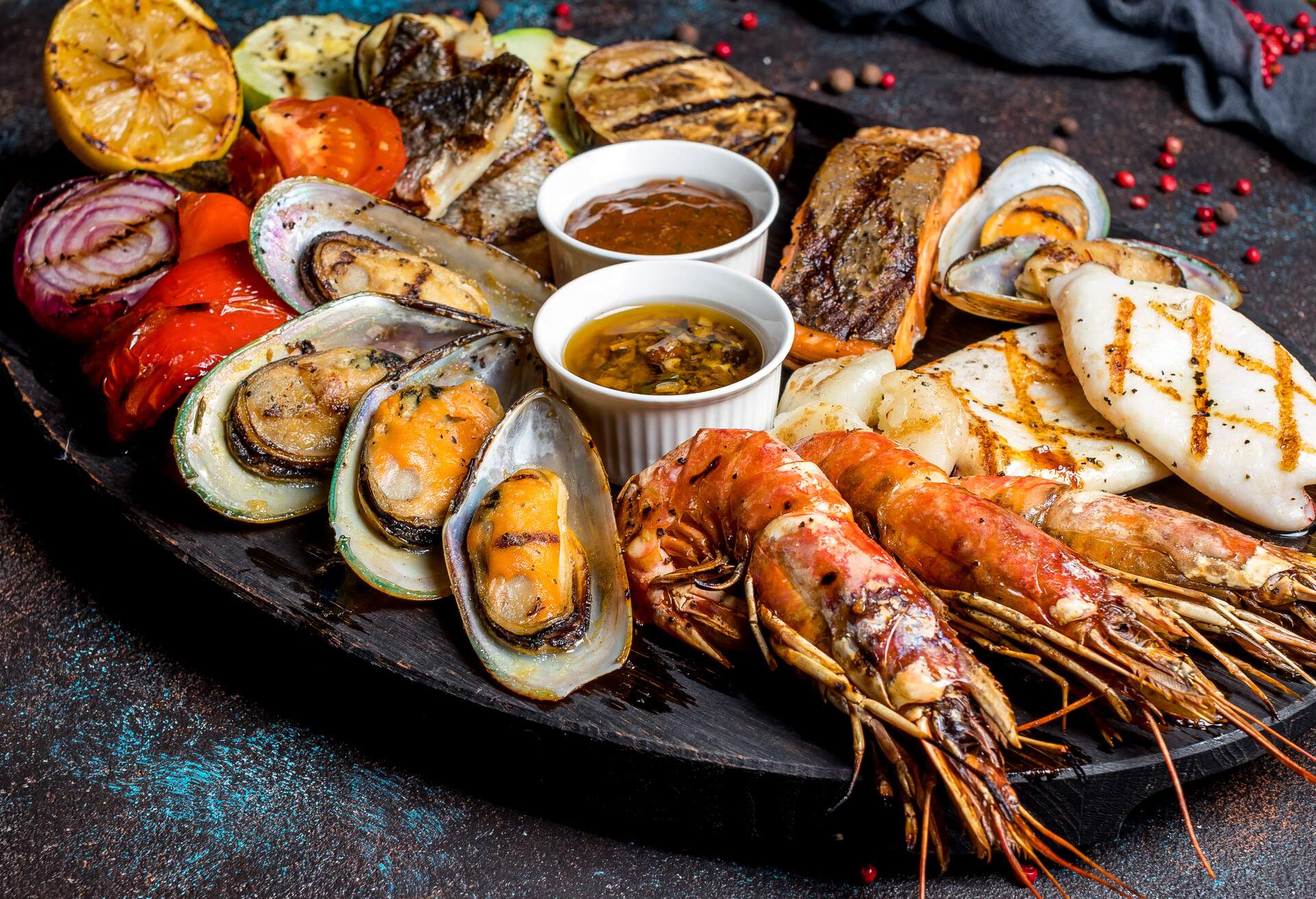 Seafood grilled on plate; Shutterstock ID 1164822205