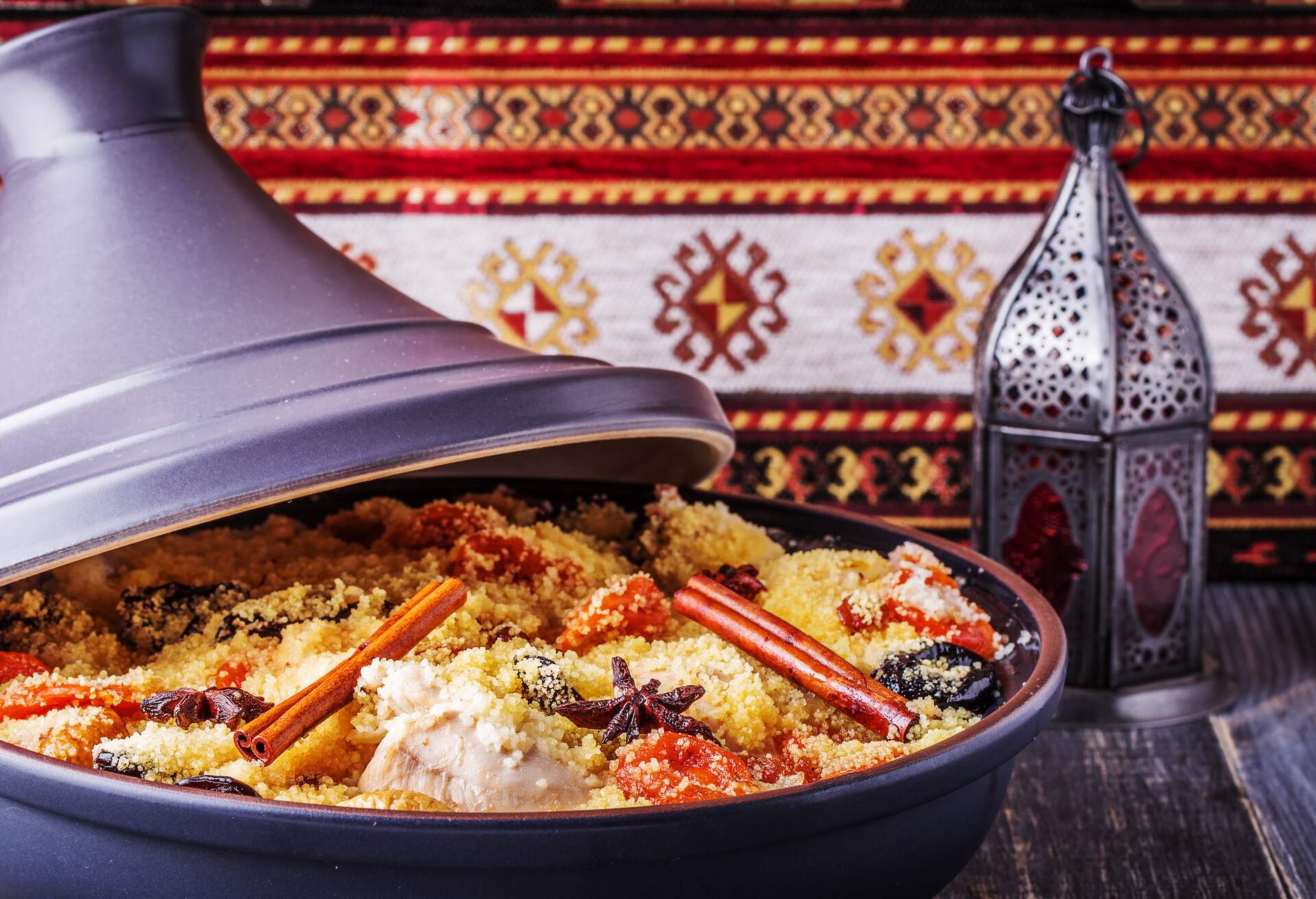 Traditional moroccan tajine of chicken with dried fruits and spices, selective focus.; Shutterstock ID 331297490