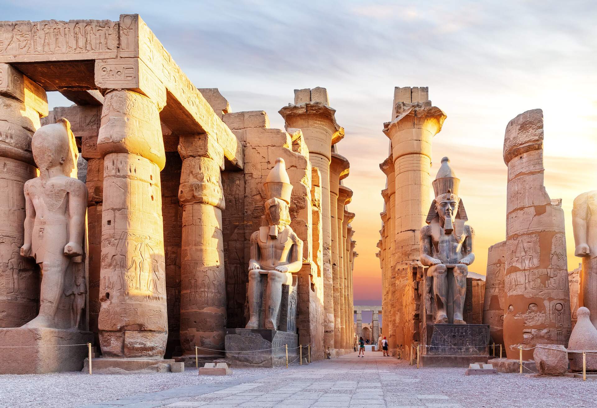 The enchanting Luxor Temple, with its colossal statues, towering obelisks, and ornate hieroglyphics, stands proudly as a testament to ancient Egyptian grandeur.
