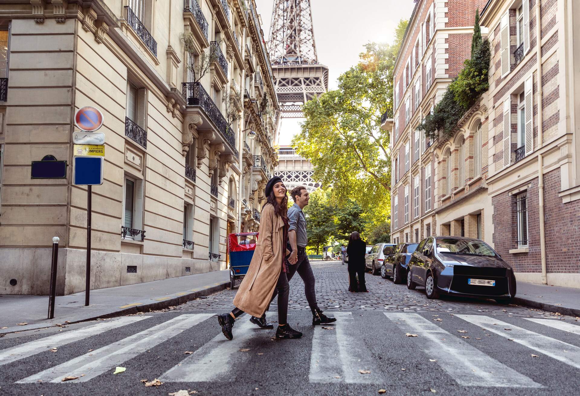 Lovely couple spending some days in vacation to Paris close to Tour Eiffel.