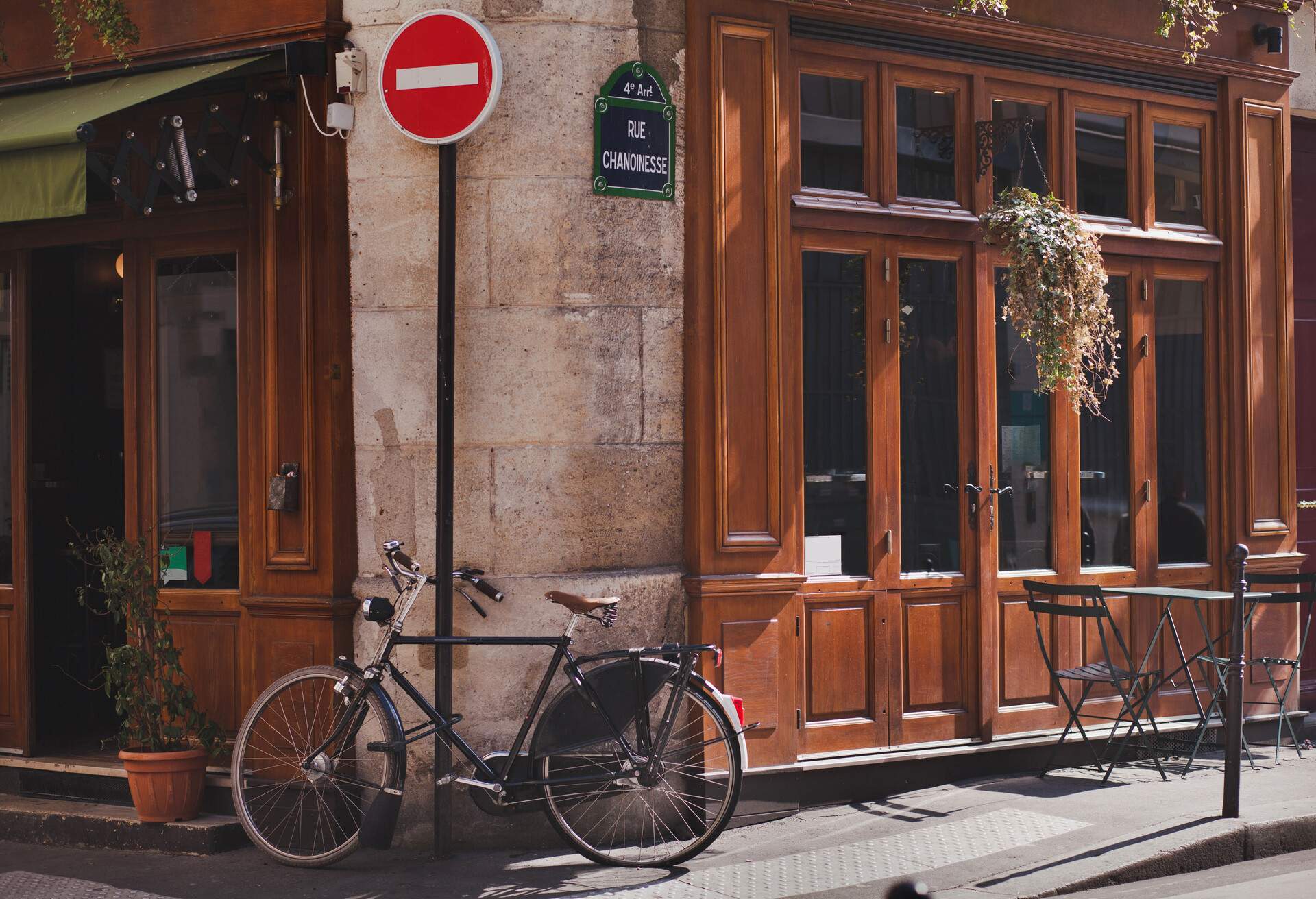Paris street and bicycle, traditional restaurant front window