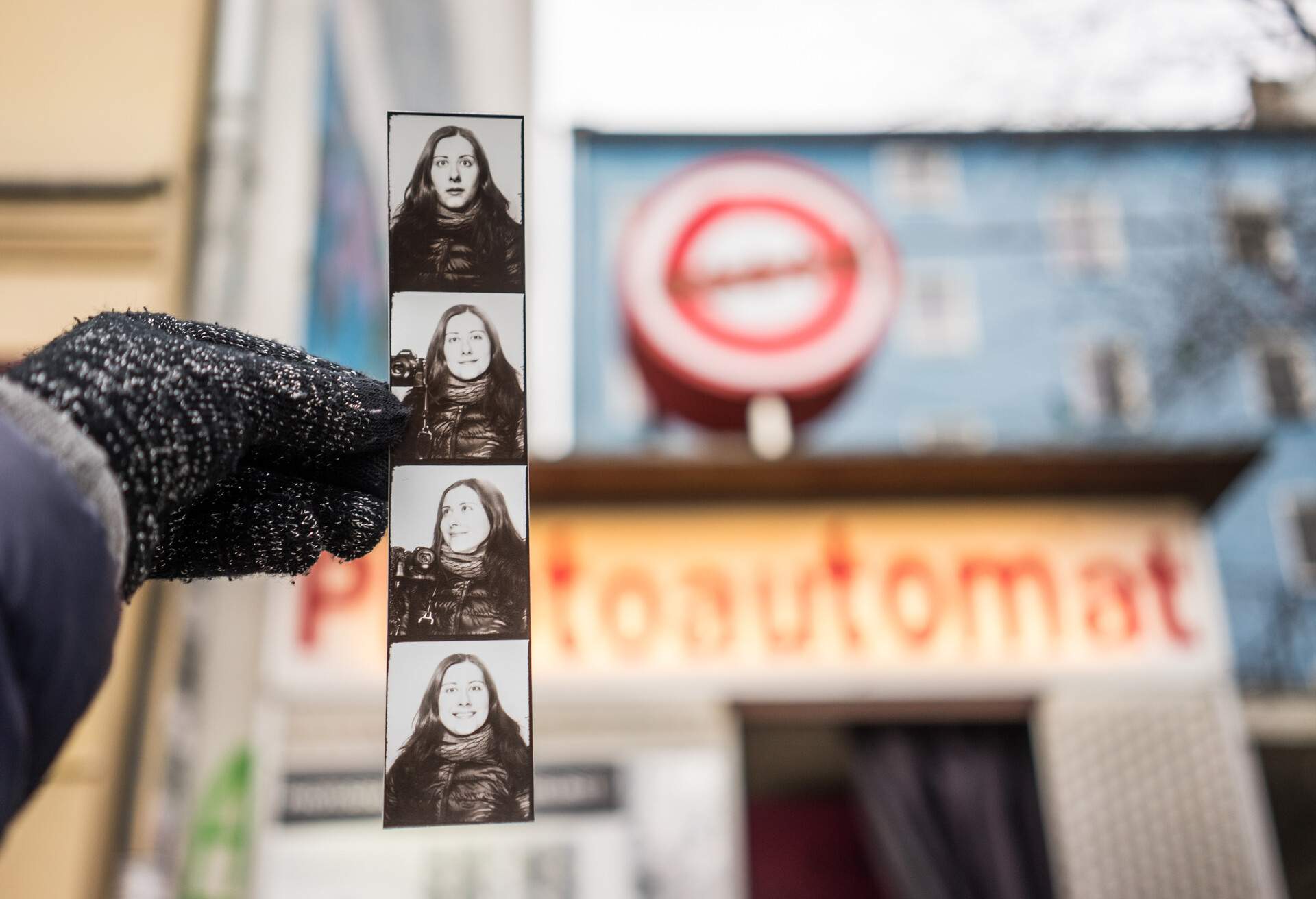 Analog film photo strip with various facial expressions - surprised, serious and happy.