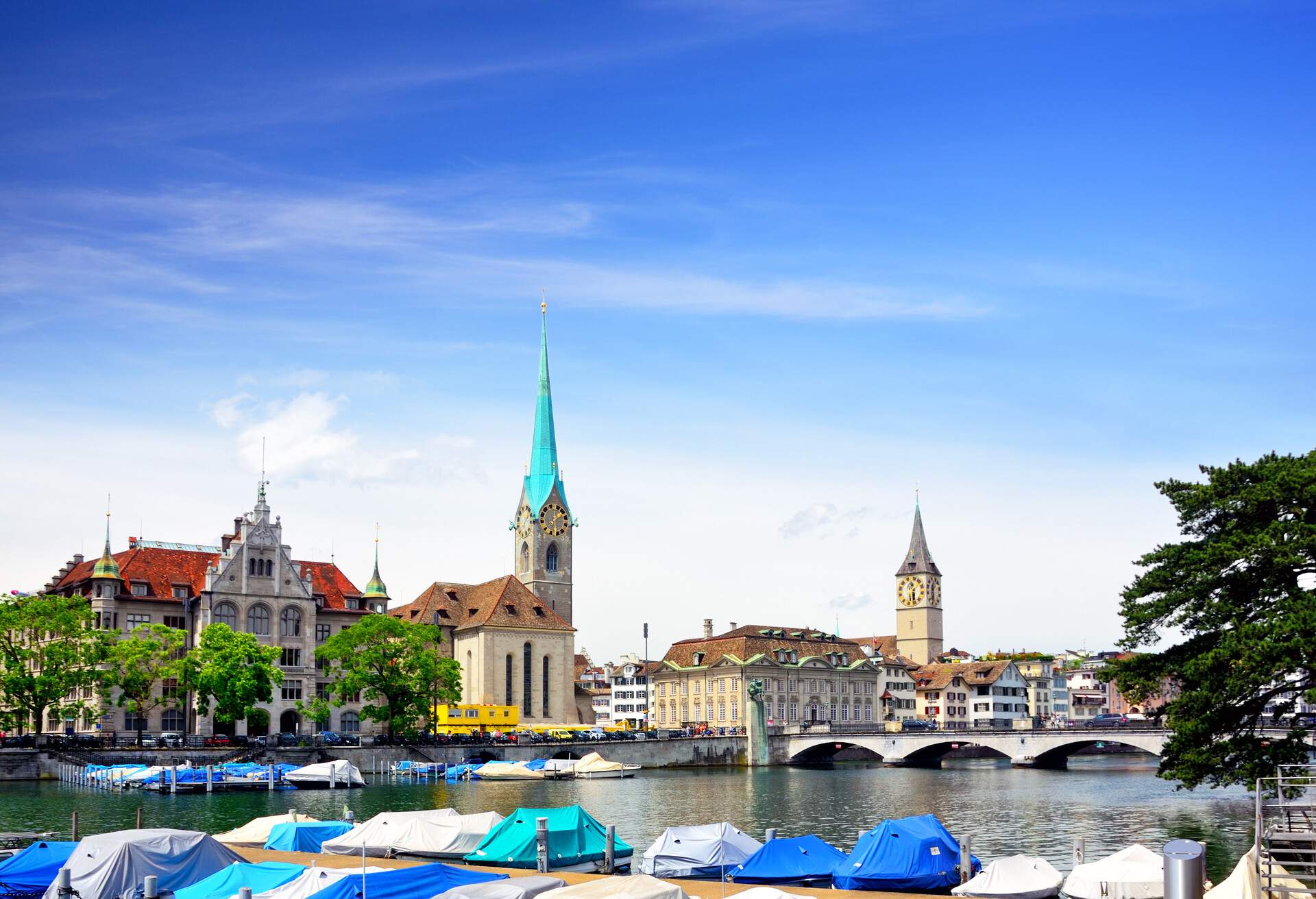 Munsterbrucke bridge over the effluence of the Limmat river in the municipality of Zurich. Composite photo