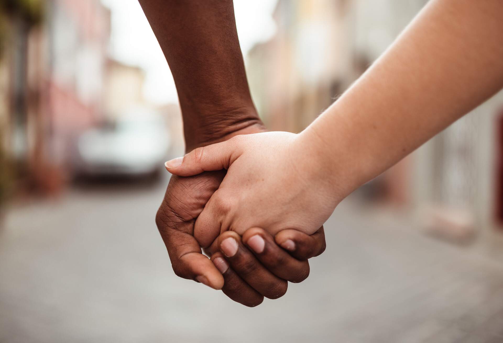 interracial holding hands