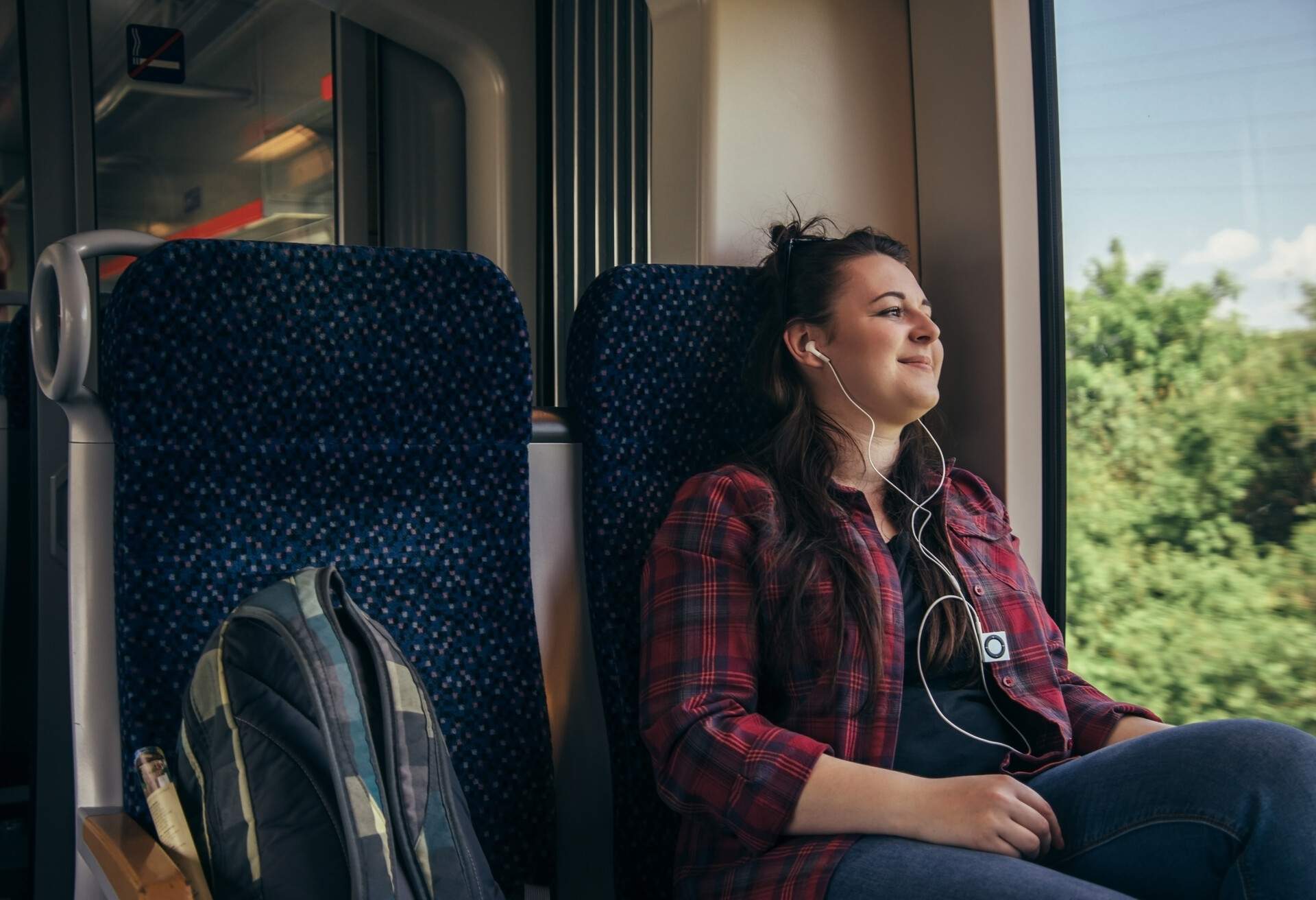 THEME_TRAIN_WOMAN_PEOPLE_GettyImages-1095541970