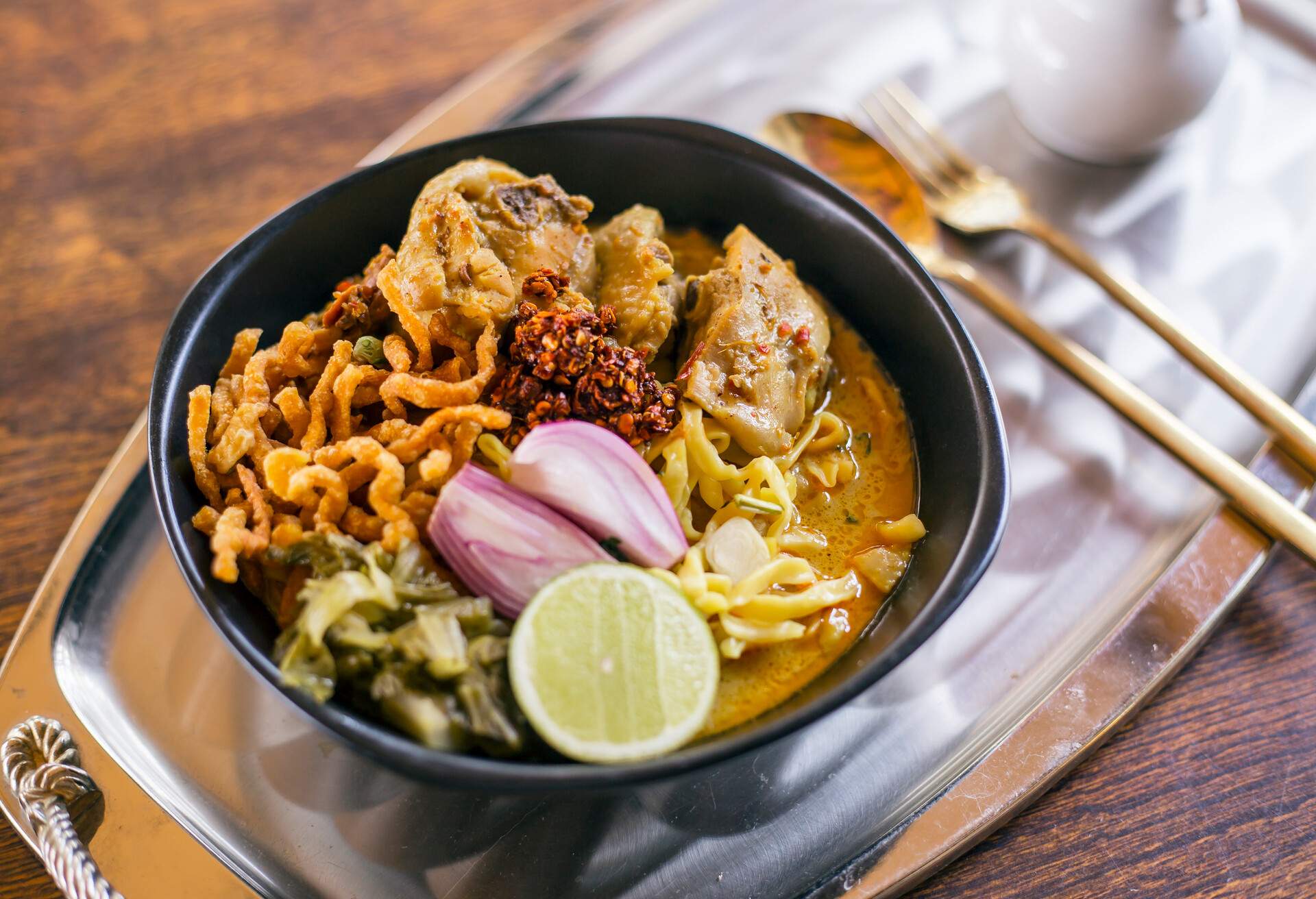 Khao soi - Traditional Thai Food, Thai curry with  A noodle dish in a yellow curry with chicken. .Khao soy a famous northern Thai food