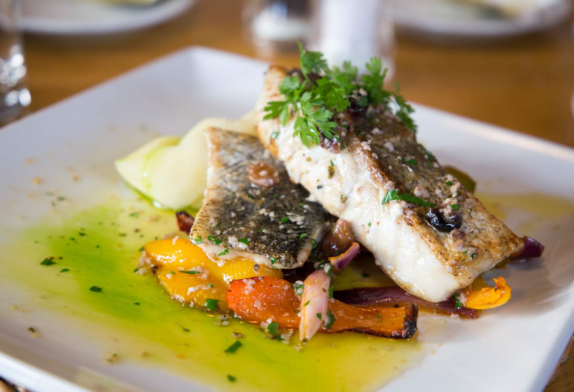 French food Grilled fish with butter and vegetables