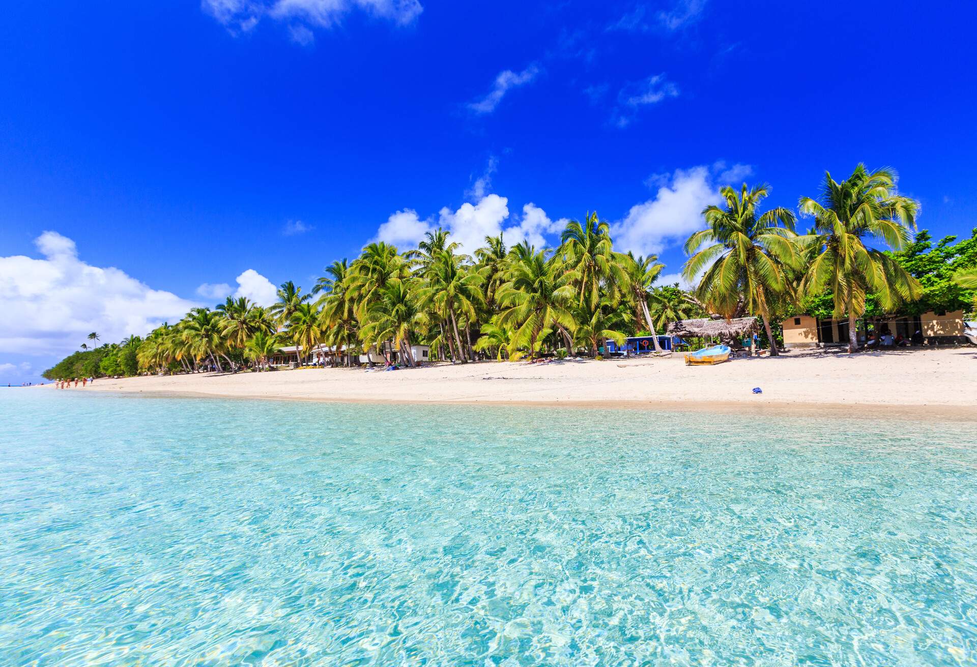 Beach on a tropical island with clear blue water. Dravuni Island, Fiji