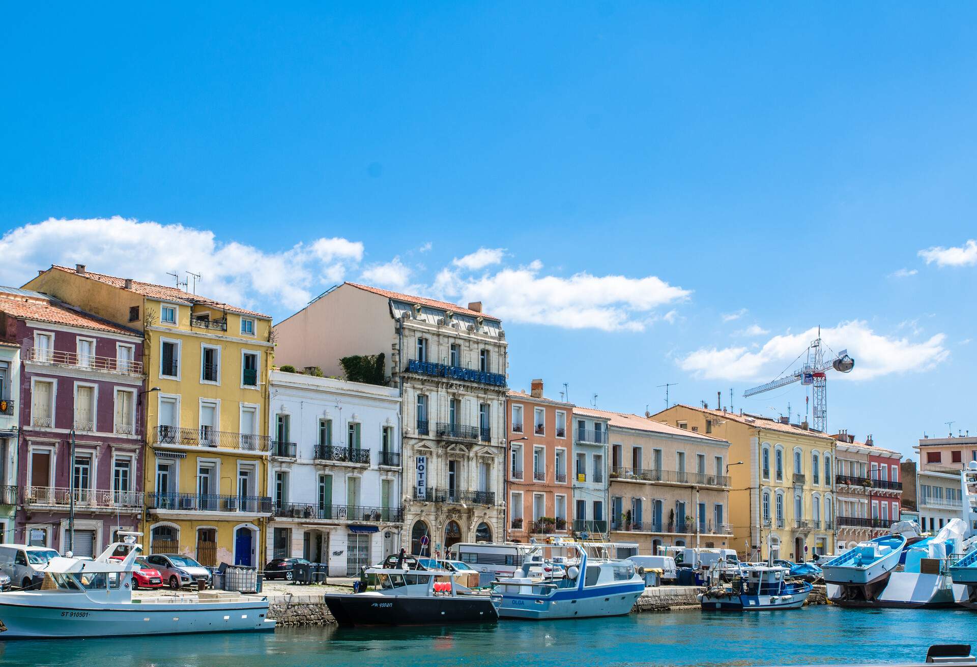 View of Sete, France with its waterways and colourful buildings on a sunny day
