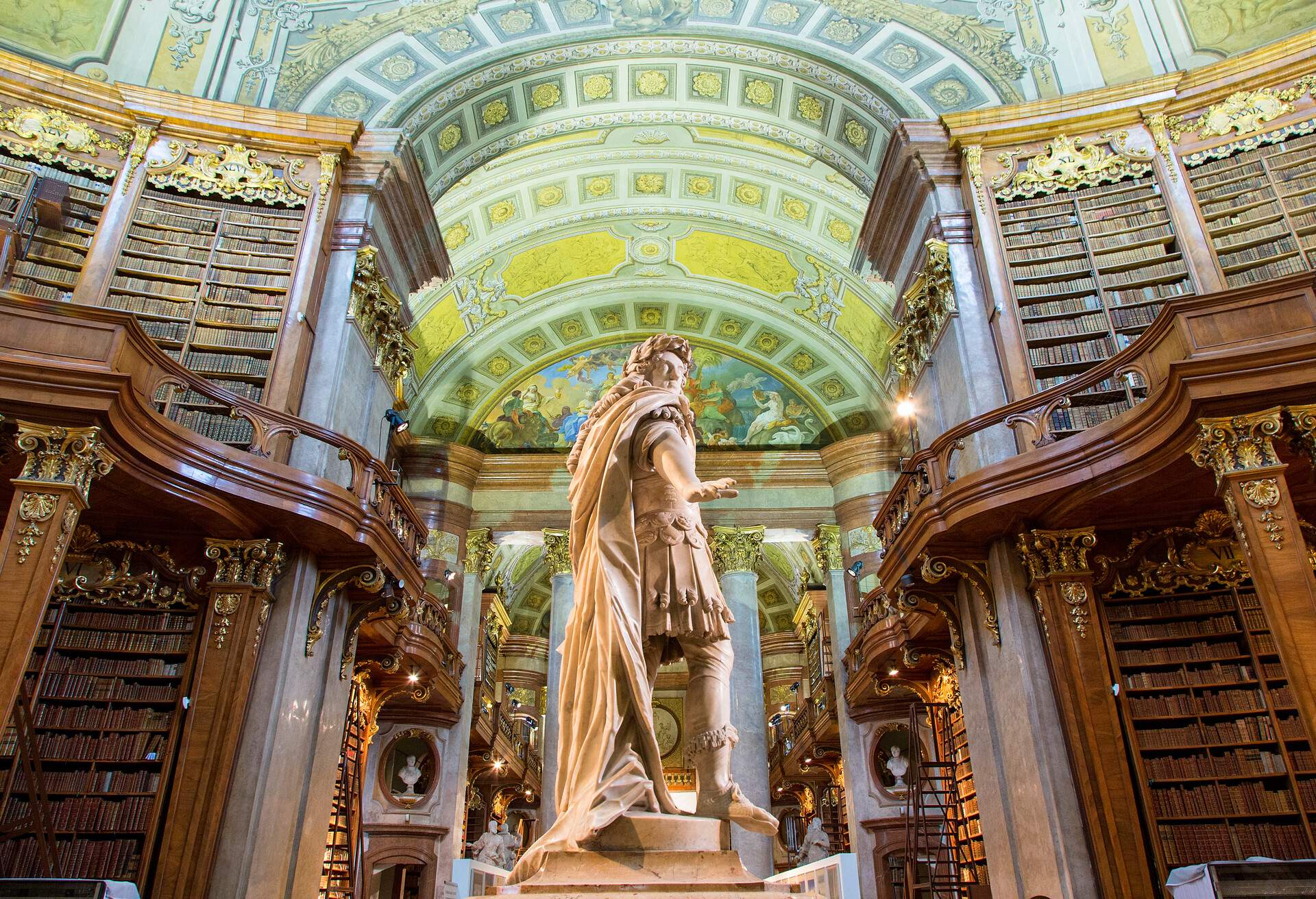 Ceremonial room with Karl VI. statue, National Library, Vienna, Austria