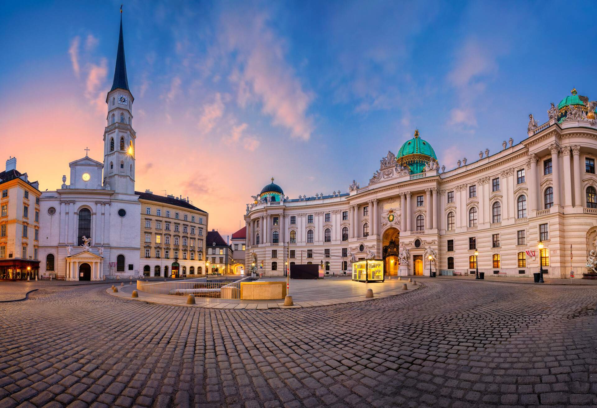 Cityscape image of Vienna, Austria with St. Michael's Square during sunrise.