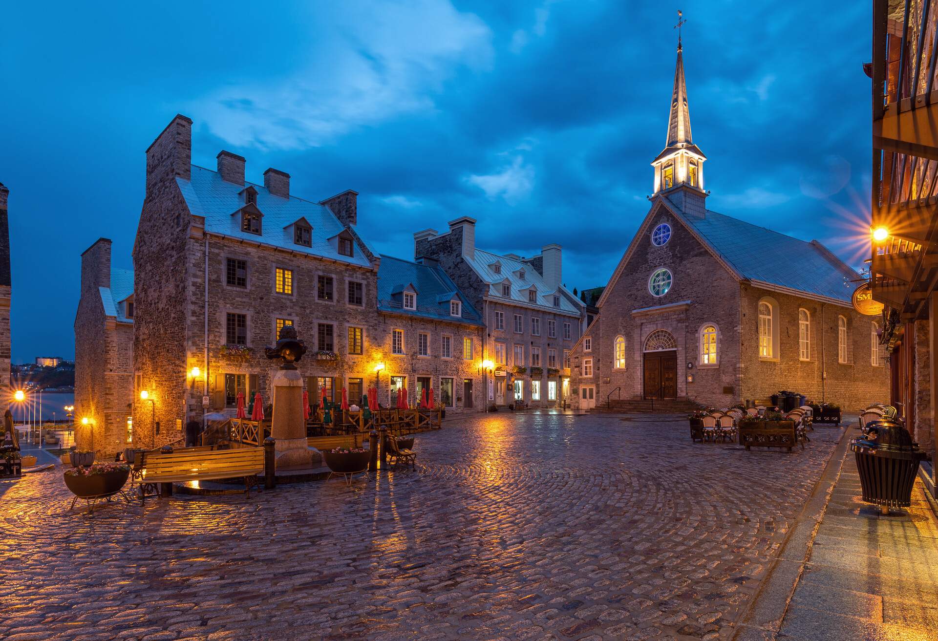 This is a photo of Notre-Dame-des-Victoires, Roman Catholic stone church on Place Royale in the lower town of Old Quebec City. Construction was started in 1687 on the site of Champlain's habitation and was completed in 1723. The church is one of the oldest in North America.