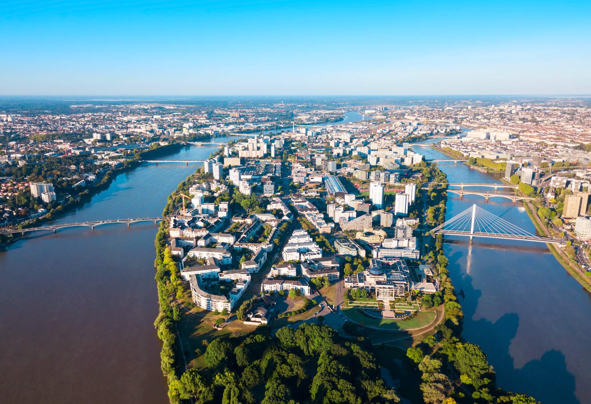 Nantes city between the branches of the Loire river aerial view in Loire-Atlantique region in France