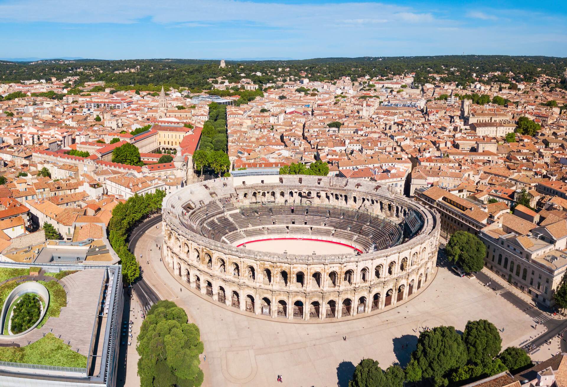 Nimes Arena aerial panoramic view. Nimes is a city in the Occitanie region of southern France