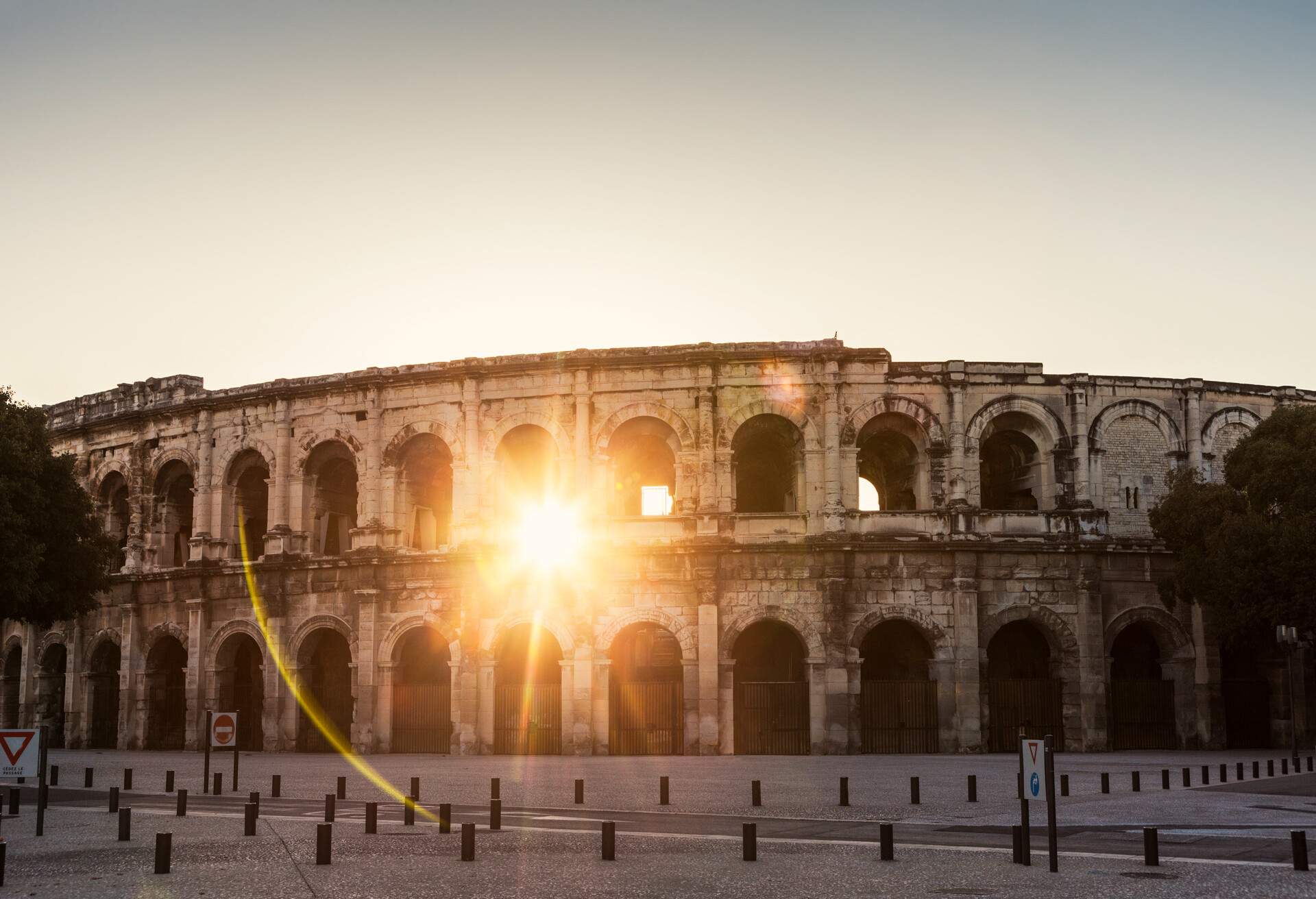 Arena of Nimes at sunrise. Nimes, Occitanie, France.