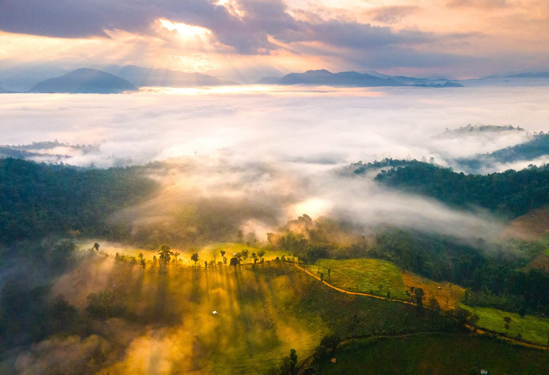 Top view from drone at Den TV, Wave of mist, sunlight and mountain curve in the morning, Chiang Mai, Thailand.