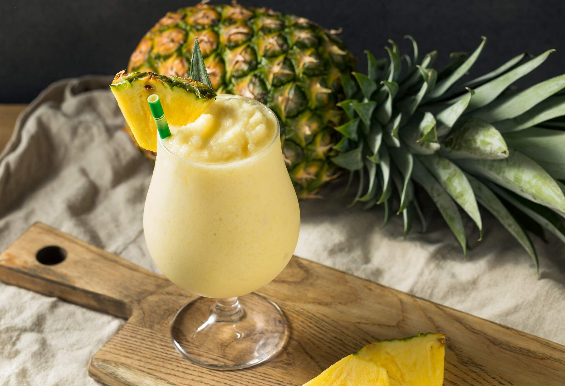 Boozy Frozen Pina Colada Cocktail with Coconut Cream