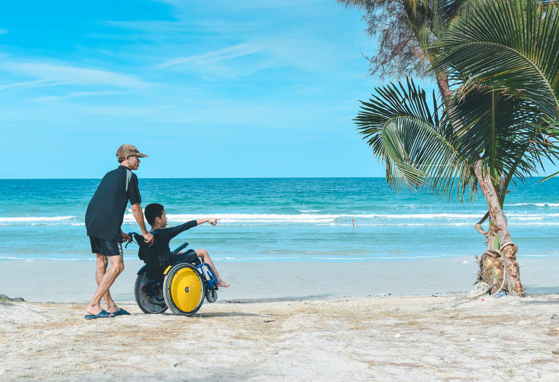 THEME_PEOPLE_TRAVEL_BEACH_WHEELCHAIR-shutterstock-portfolio_1420355063