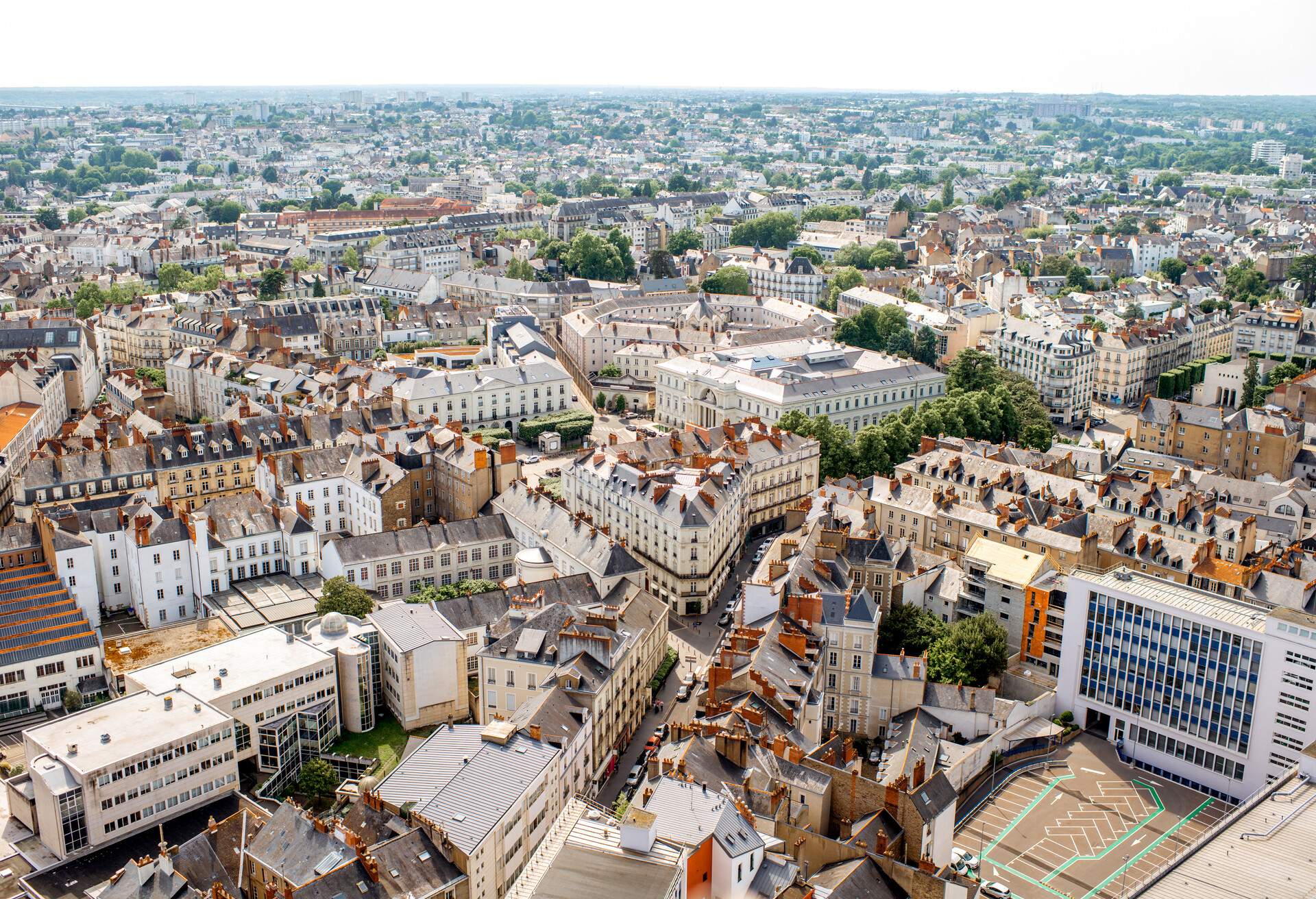 Aerial cityscape view with beautiful buildings and in Nantes city during the sunny weather in France