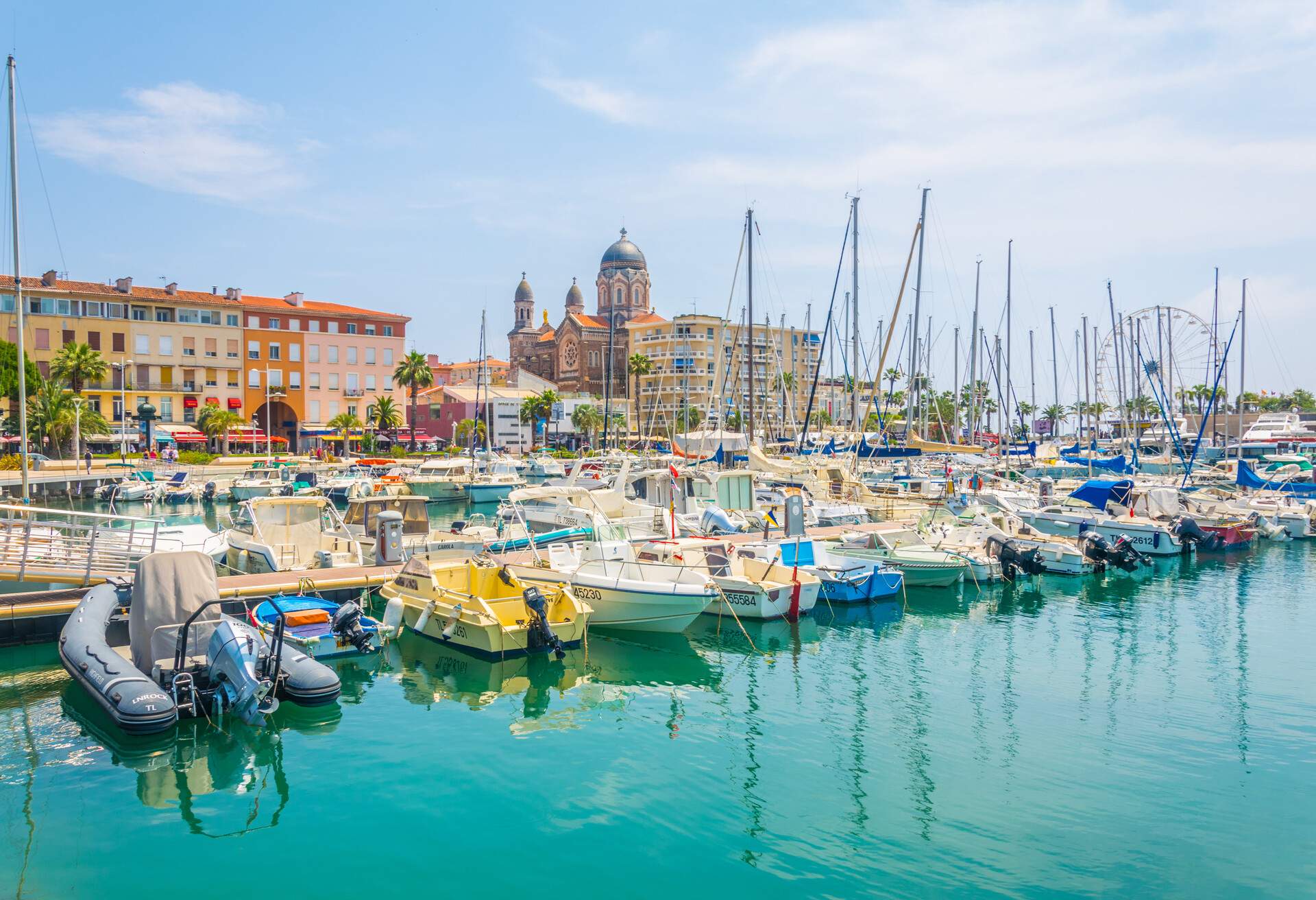 Marina in Saint Raphael dominated by church of our lady of the victory 