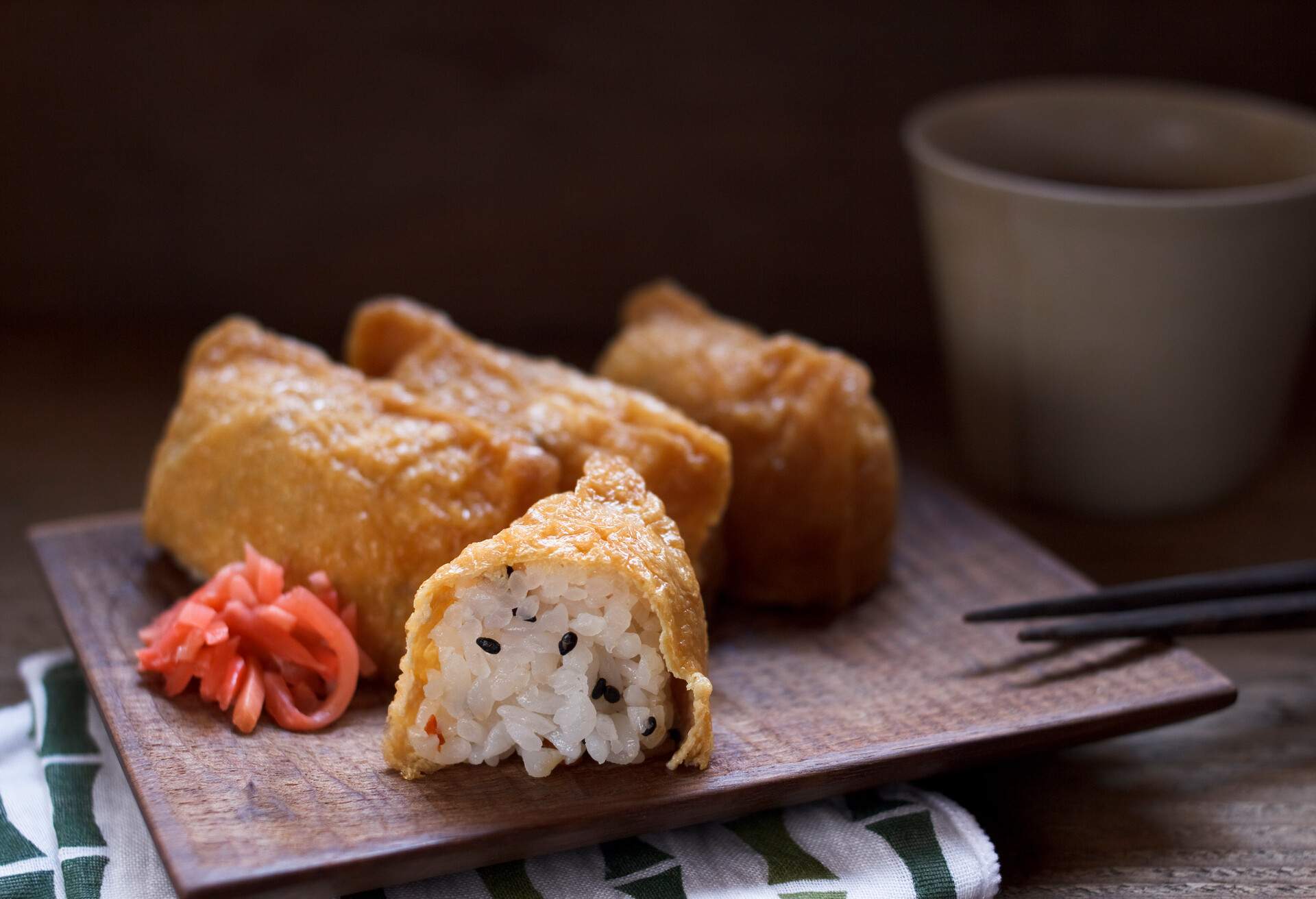 Sushi rice wrapped in fried Tofu (bean curd).