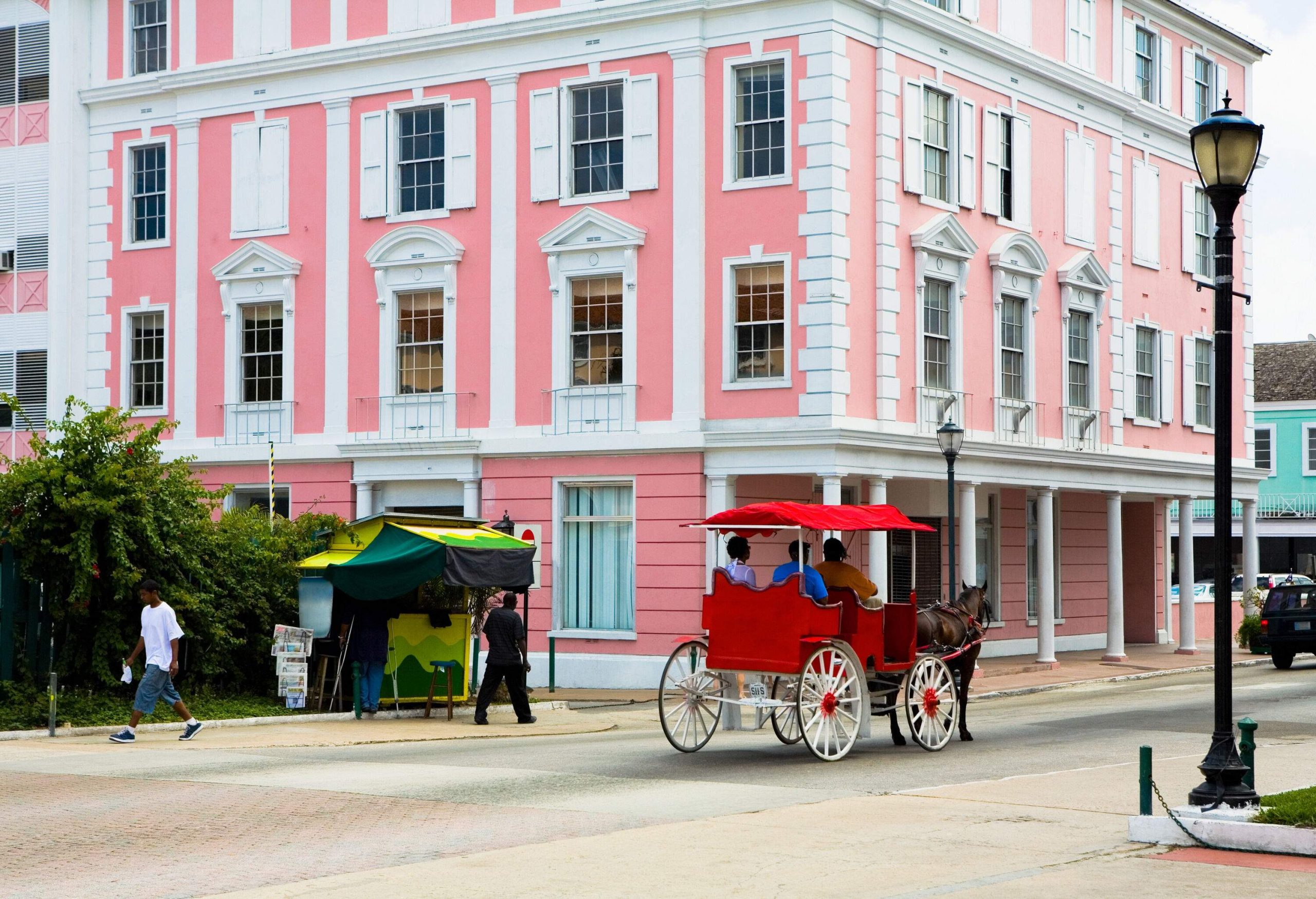 dest_bahamas_nassau_bay_street_people_horse_cart_gettyimages-79195467