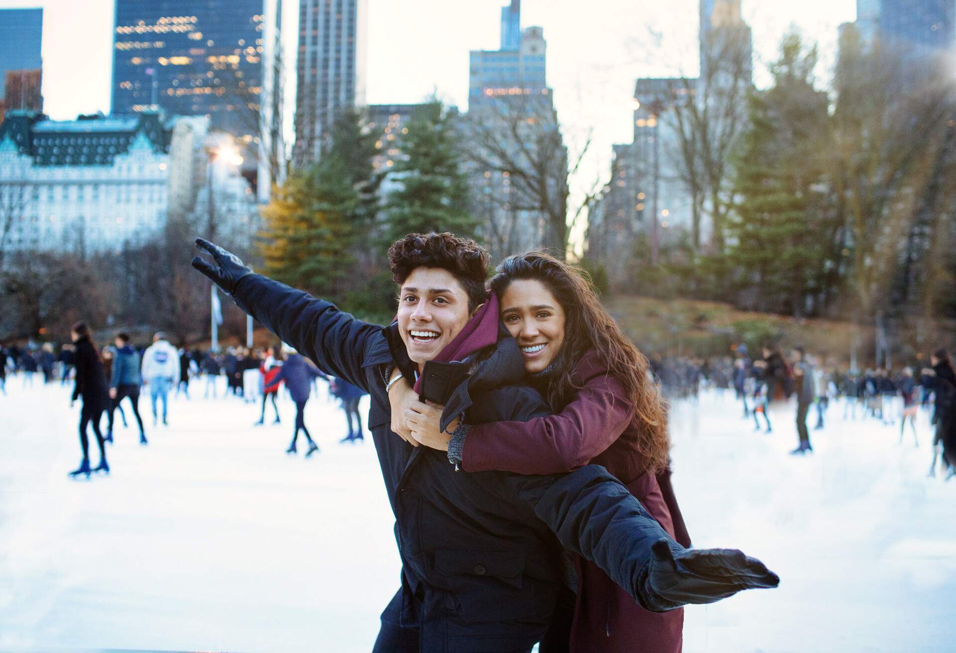 Couple ice skating in central park