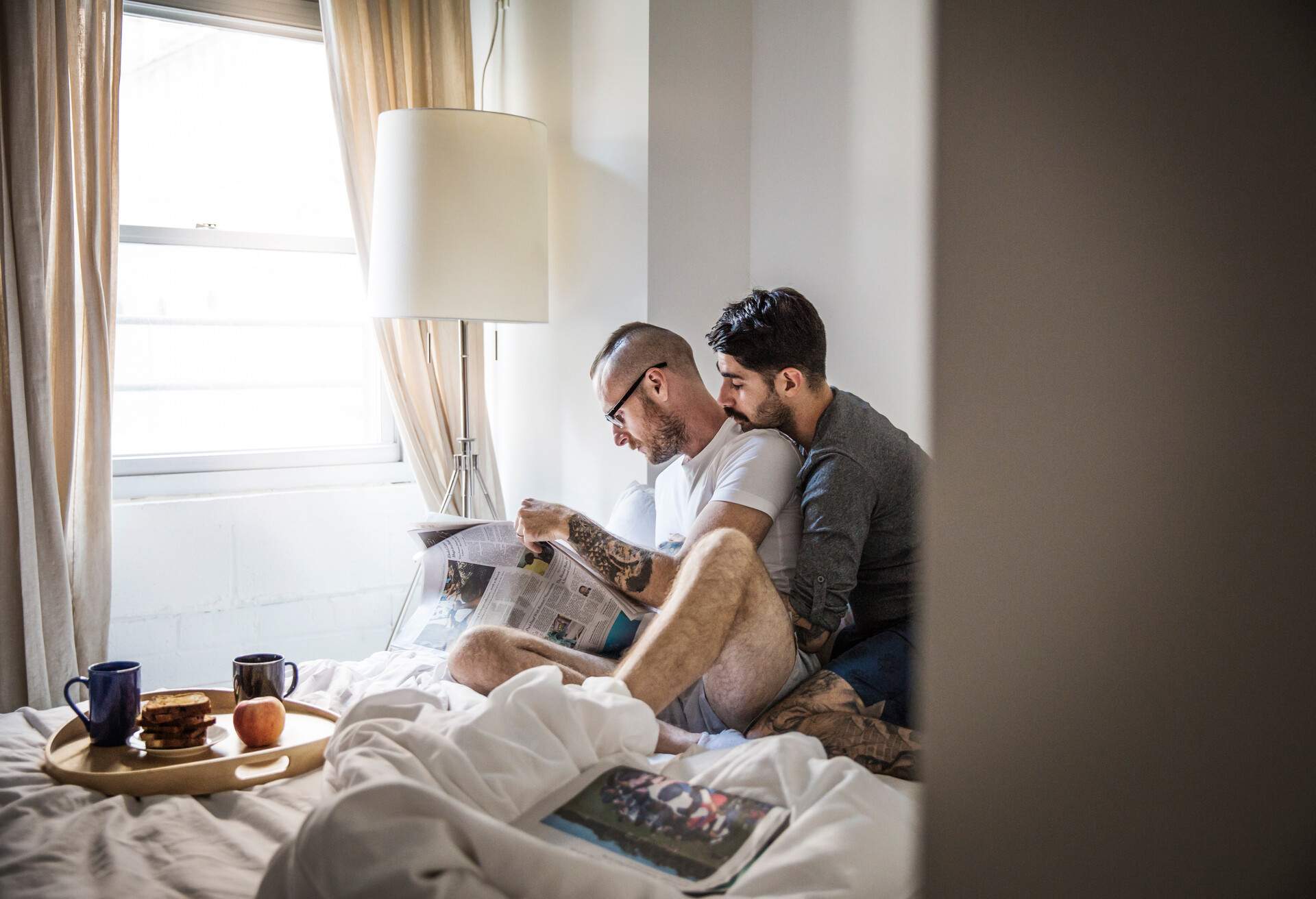 THEME_PEOPLE_MEN_GAY_COUPLE_HOTEL_NEWSPAPER_BED_BREAKFAST_GettyImages-962357948.jpg