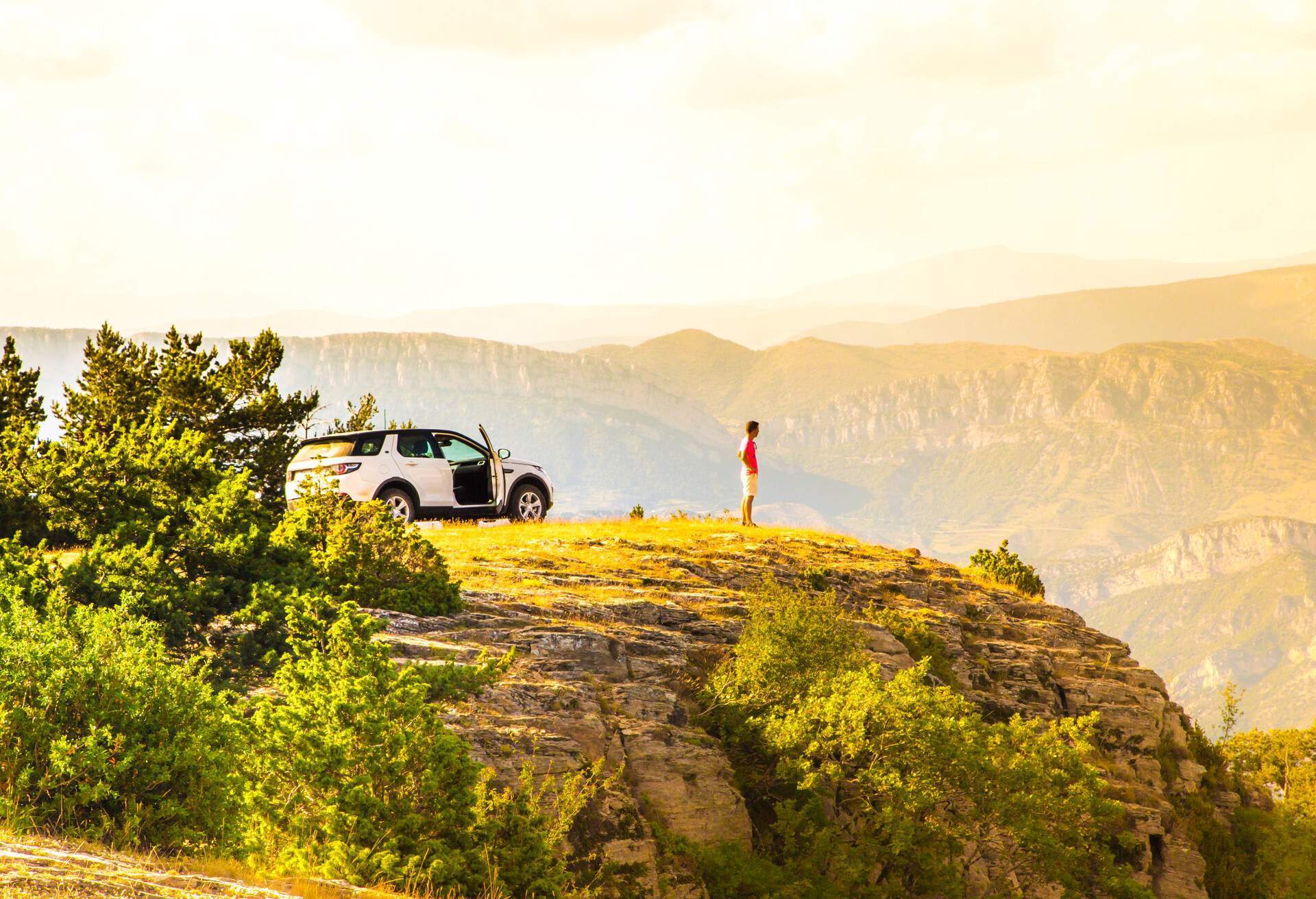 dest_spain_catalan-pyrenees_mountains_car_people_roadtrip_gettyimages-547075112_universal_within-usage-period_71762