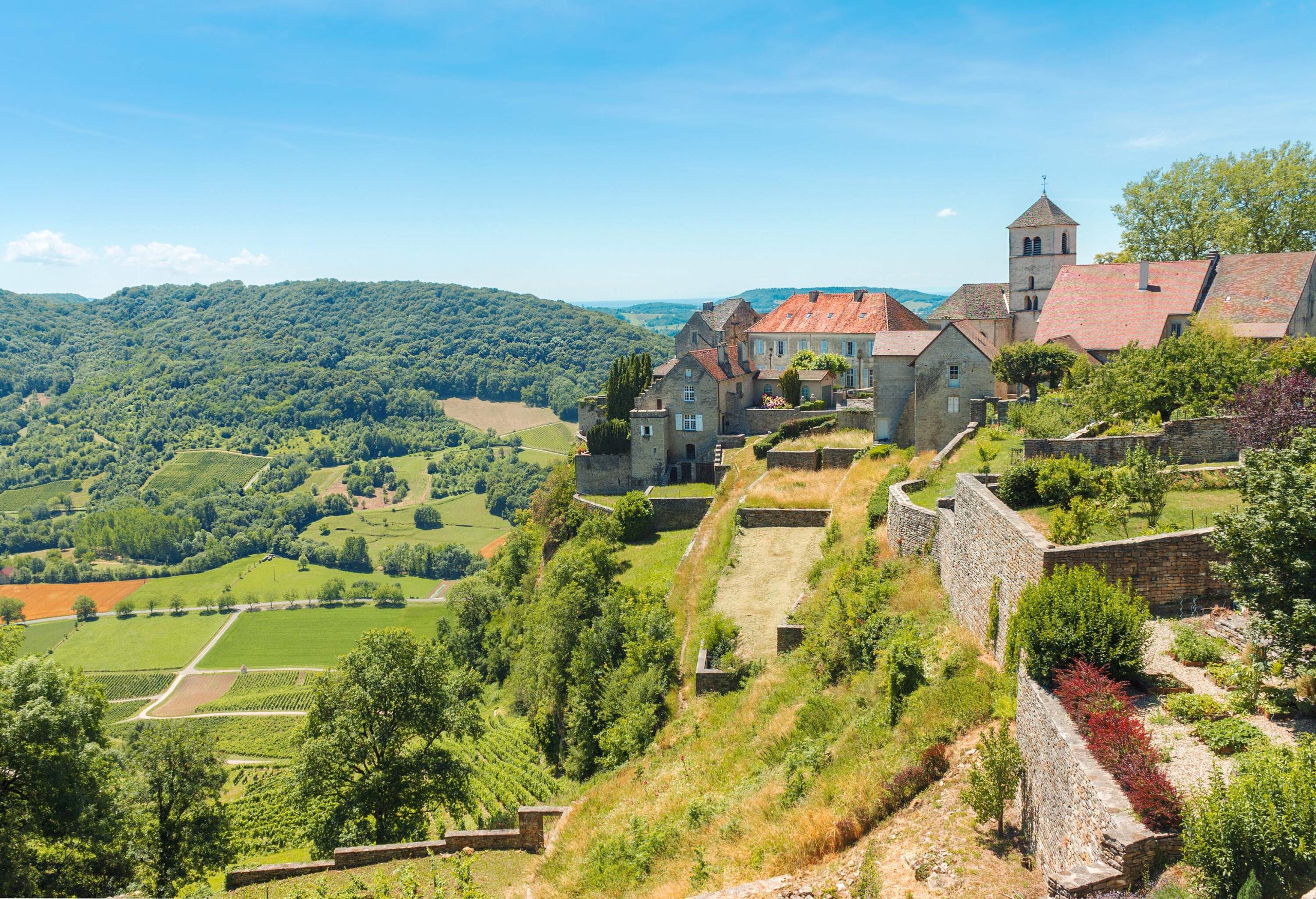 View of the picturesque medieval village in valley. Chalon, Departement Jura, Franche-Comte, France