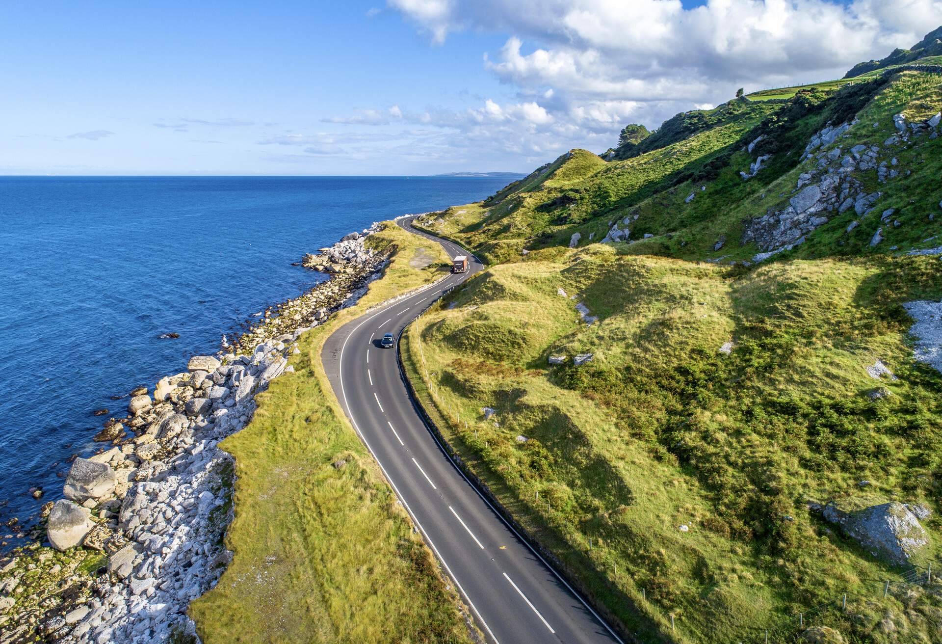 dest_northern-ireland_causeway-costal-route_antrim_theme_car_roadtrip_gettyimages-1130149435_universal_within-usage-period_87485