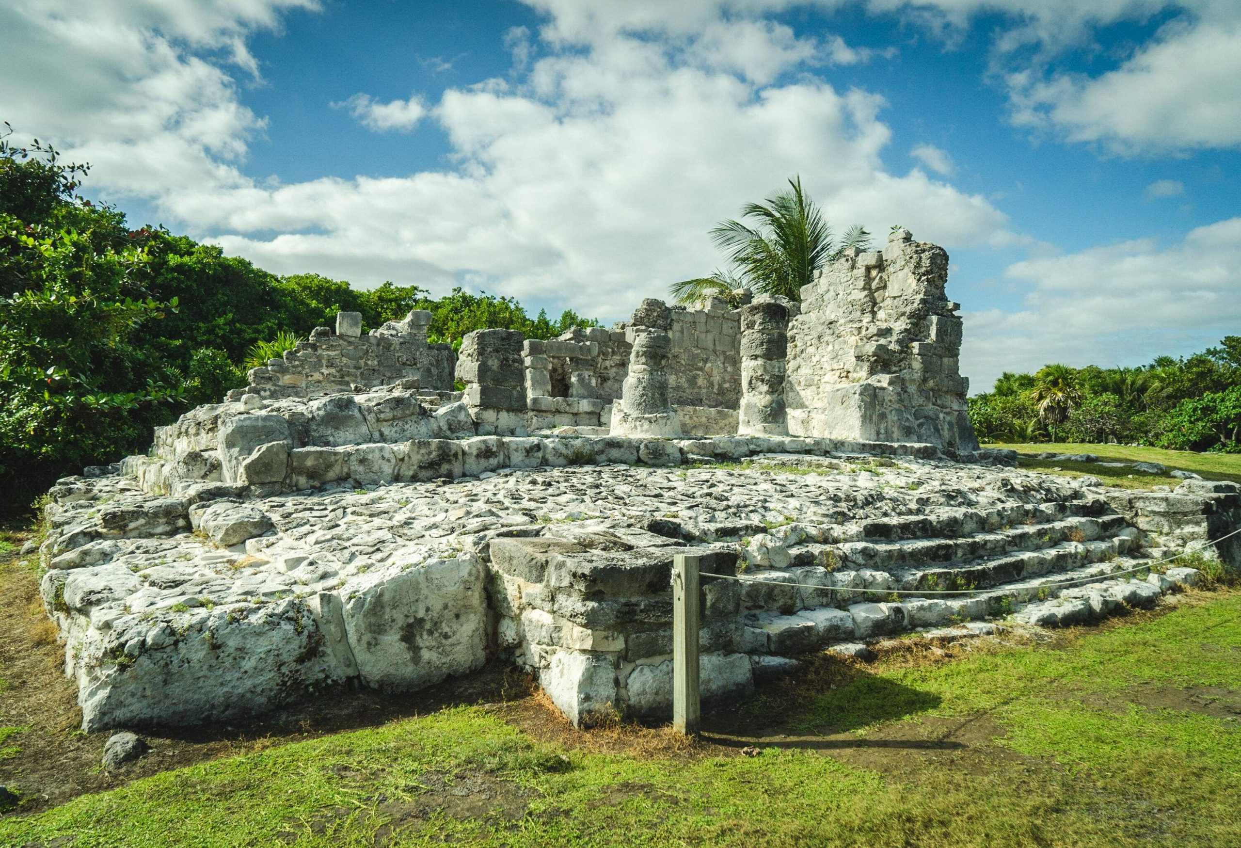 A striking Mayan ruin stands tall, showcasing a remarkable stone structure that exemplifies the architectural and cultural legacy of the ancient Mayan civilization.