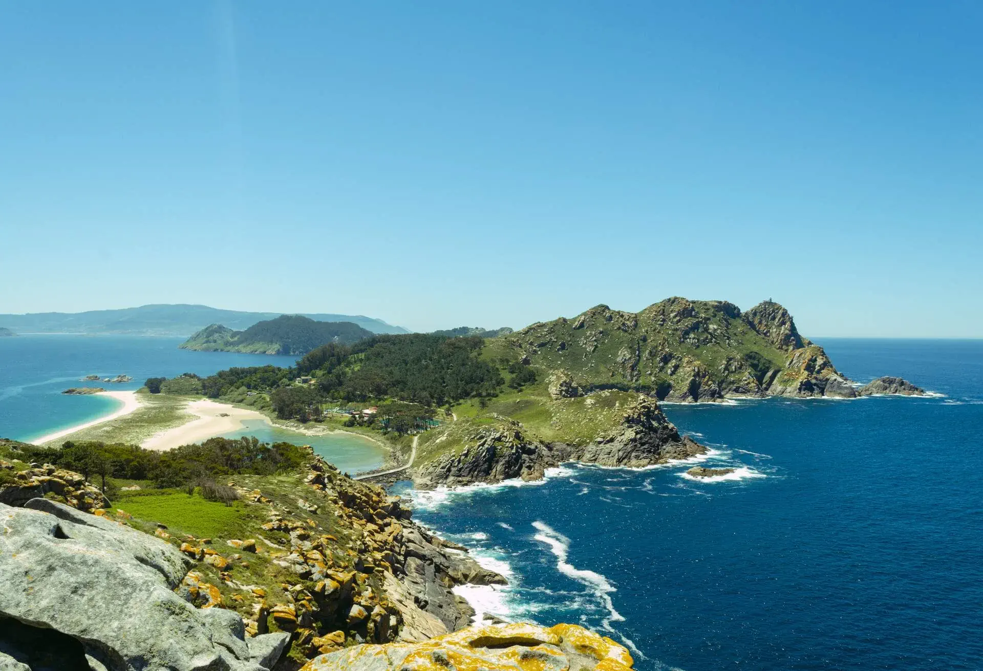 A rugged mountain with a rocky coastline.
