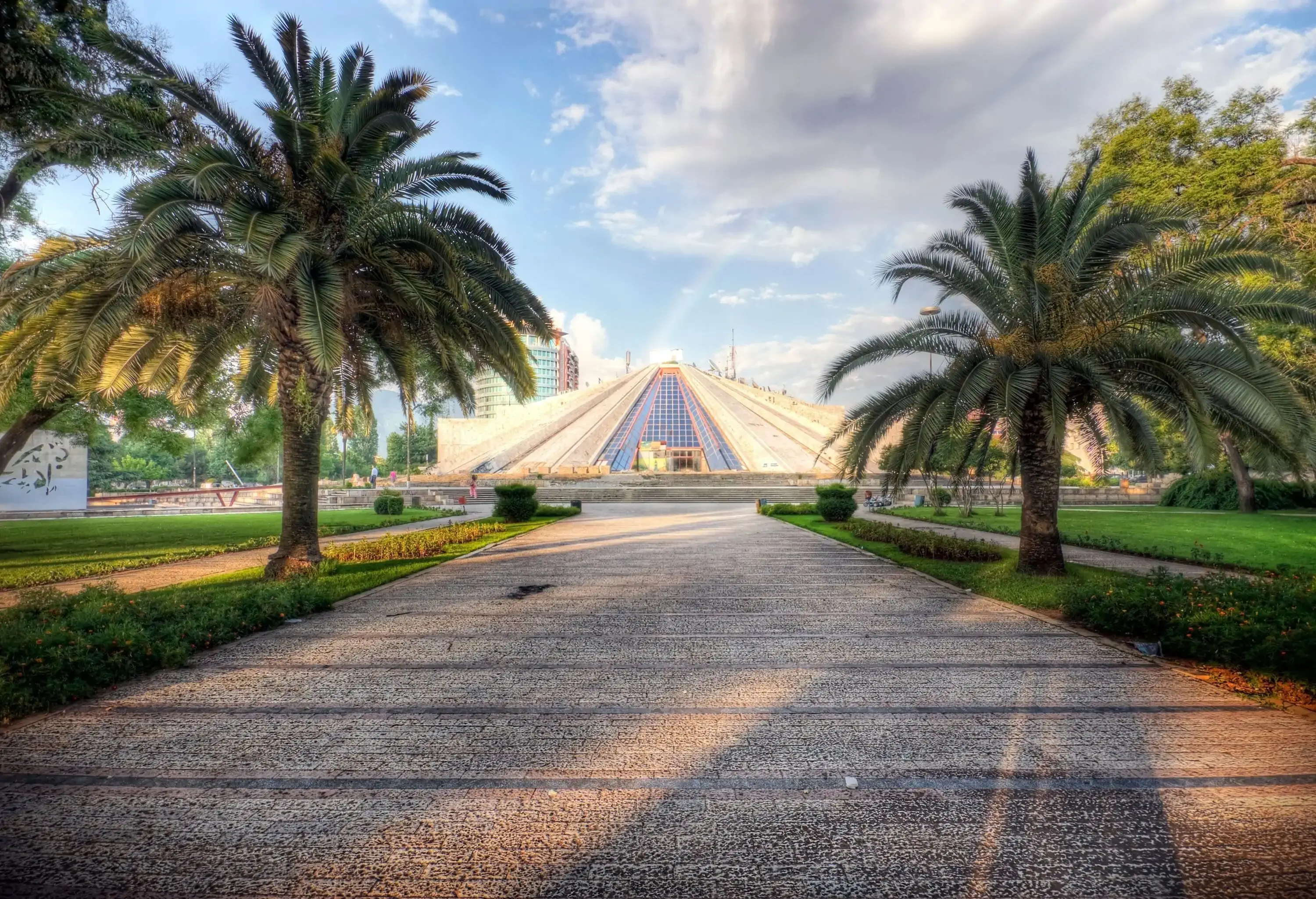 The Pyramid of Tirana, a striking and unique architectural landmark, stands boldly in the heart of the city.