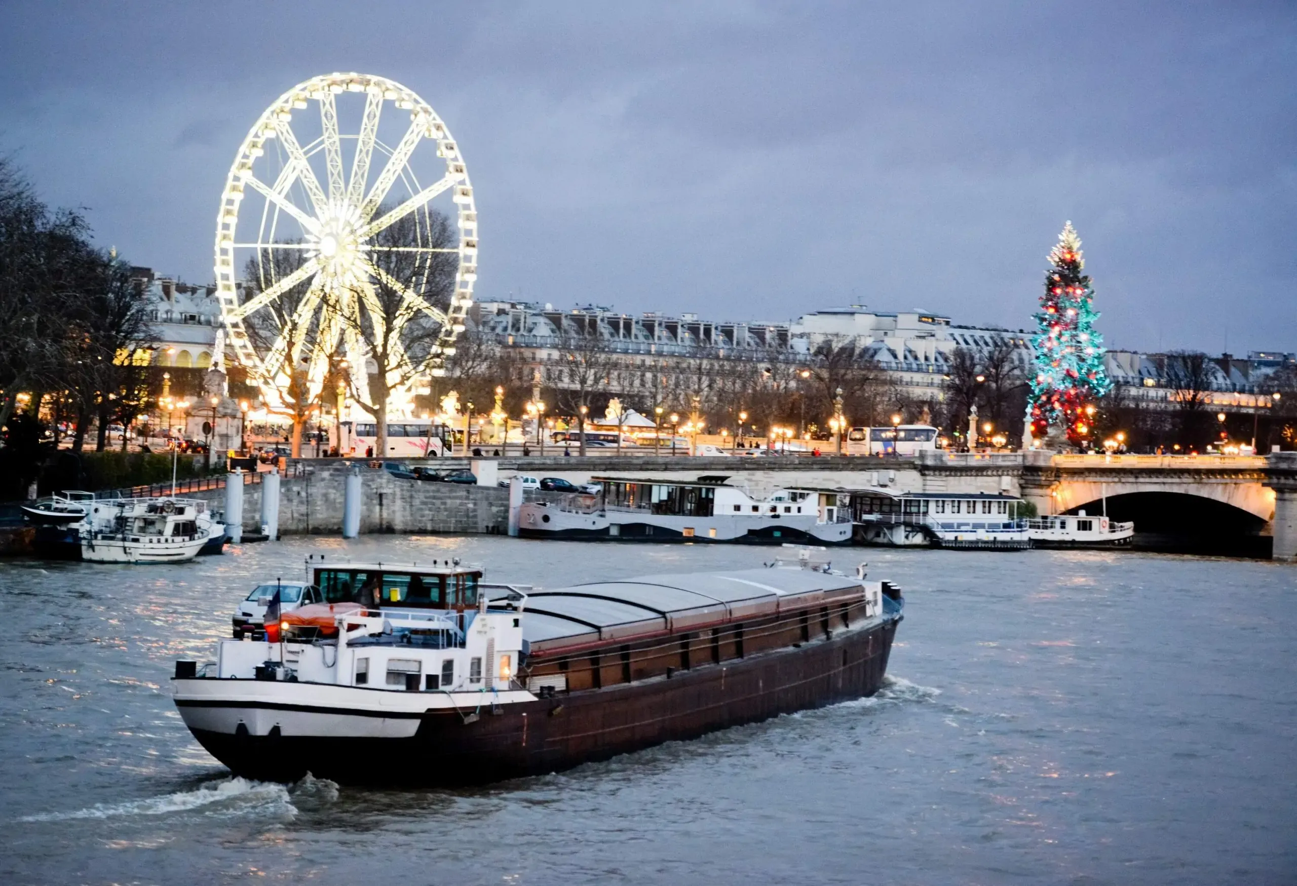 Christmas in Paris. Boat on Seine River.